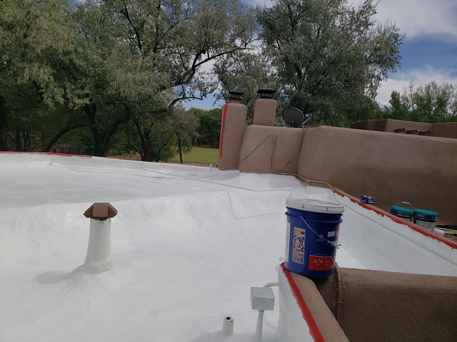 Residential roof application by SPF Services 