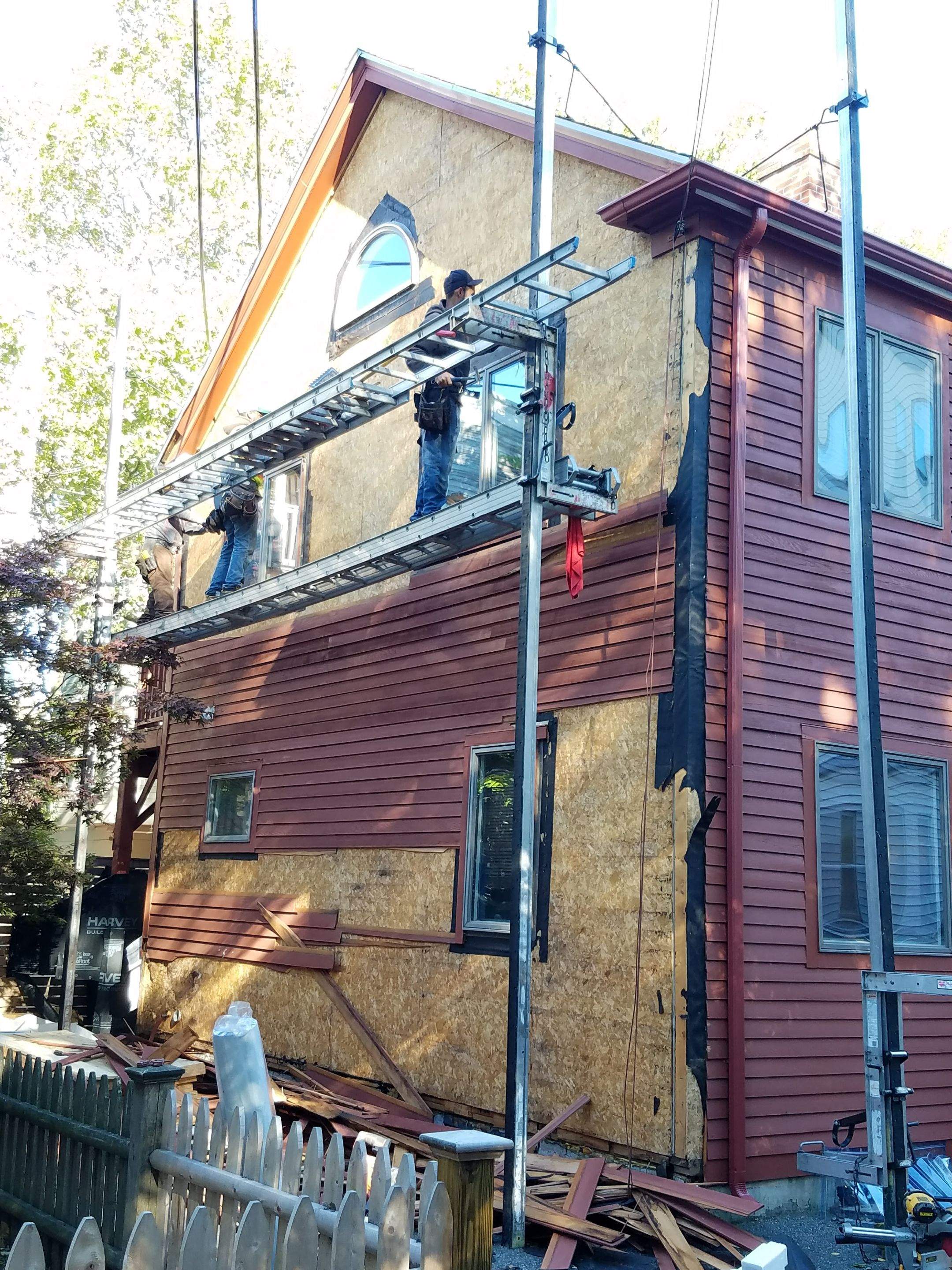 Siding Installation using Cedar Clapboard by Loyalty Exterior Solutions 