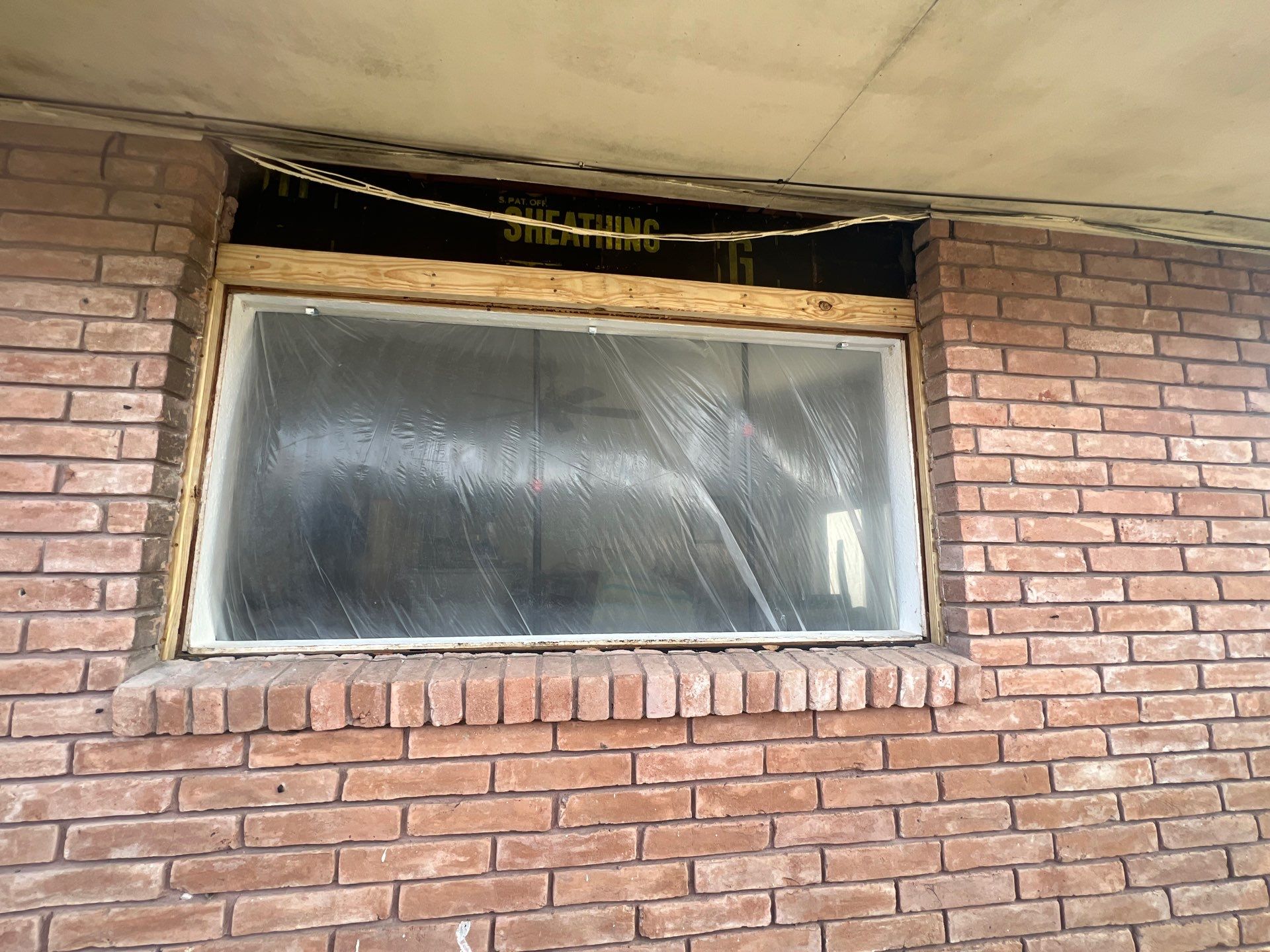 Windows in Brick with a Bay Window by Bayfront Roofing and Construction