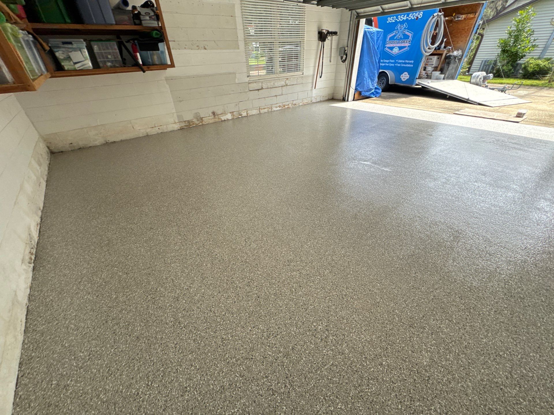Garage with Cabinets in Gainesville, FL in Mount Everest by Cross Creek Concrete Coatings