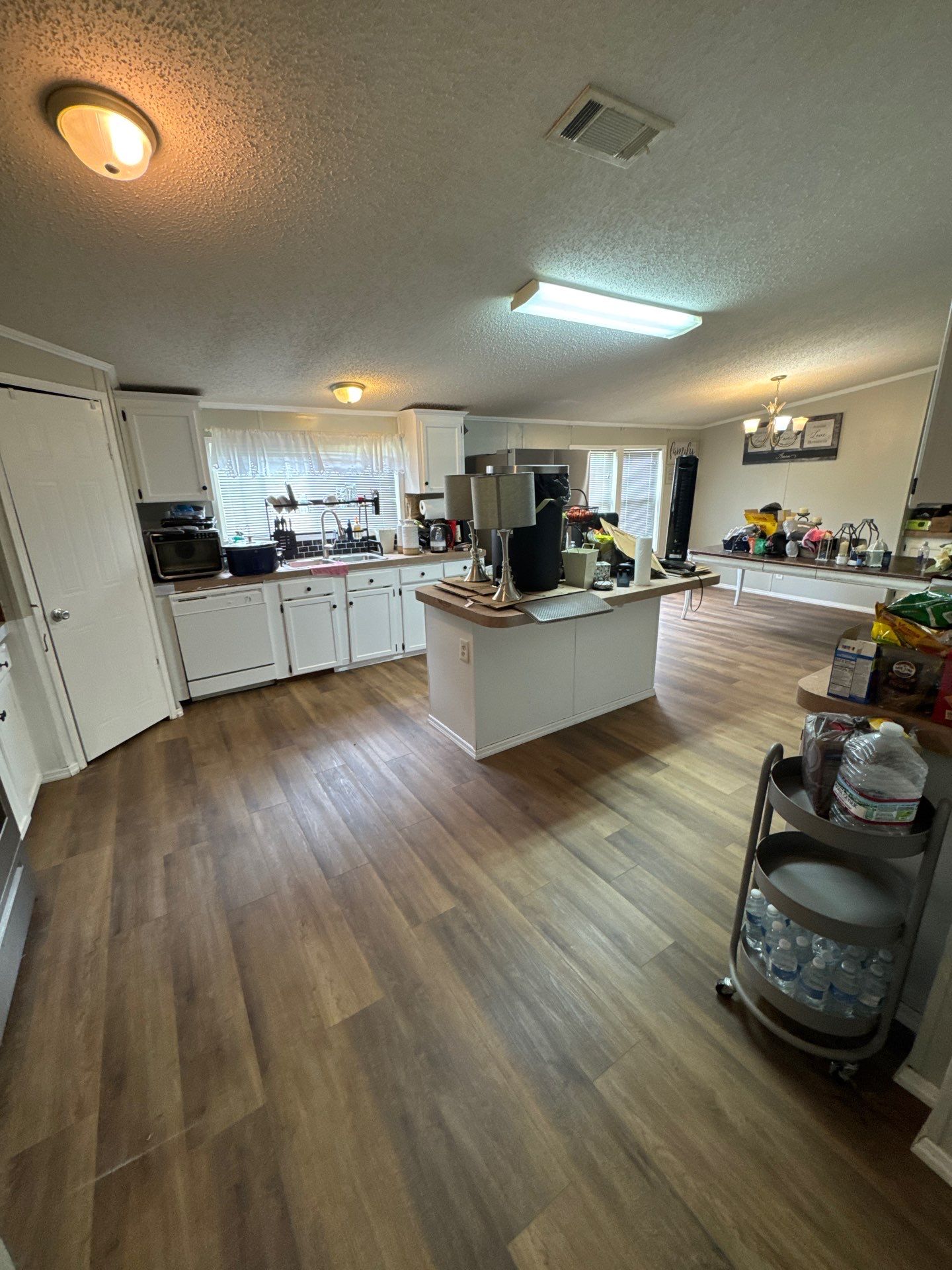 Subfloor Repairs With LVP Installation by Axtra Hand