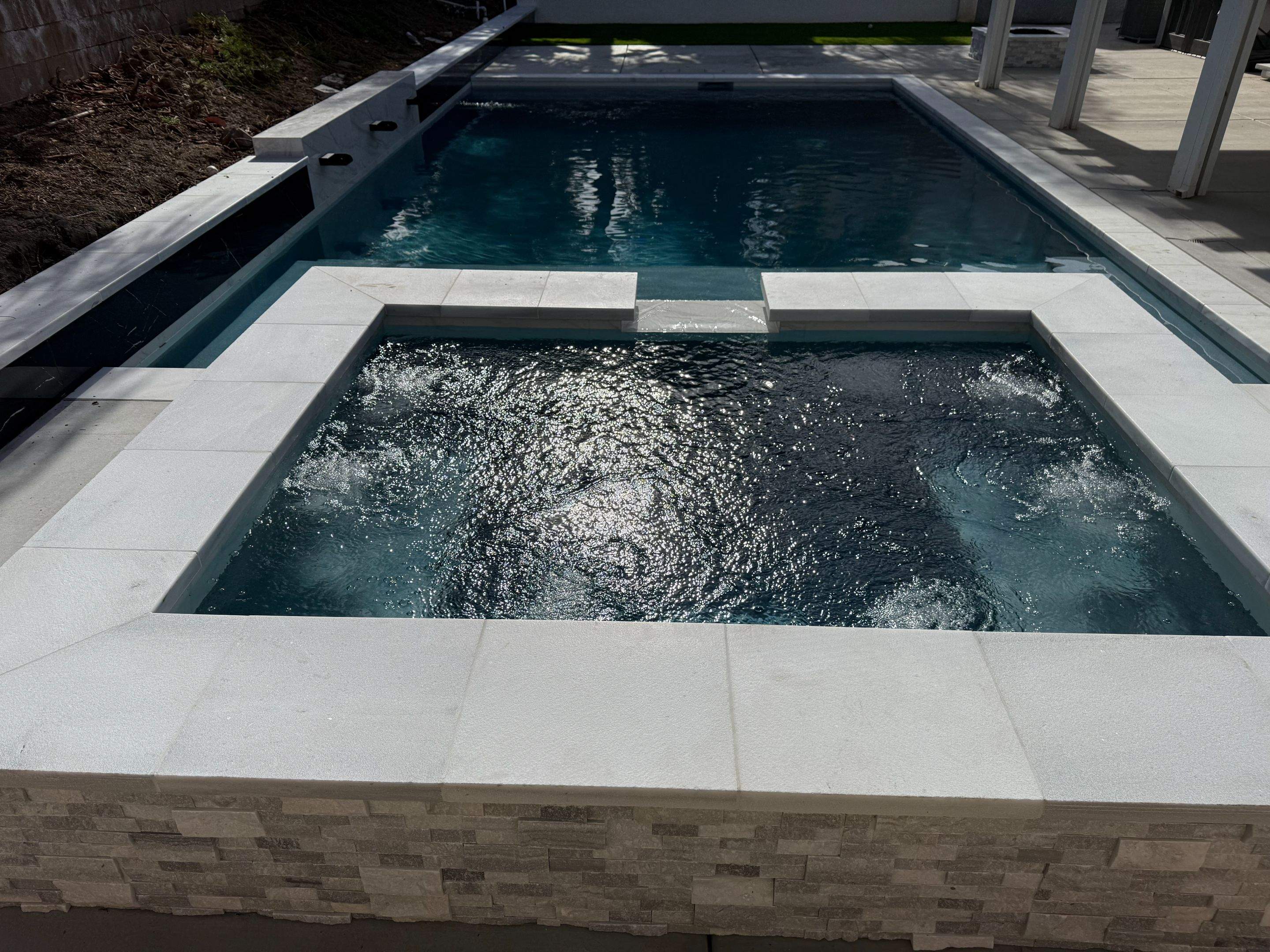 Pool and spa by Premier Pools and Spas Temecula
