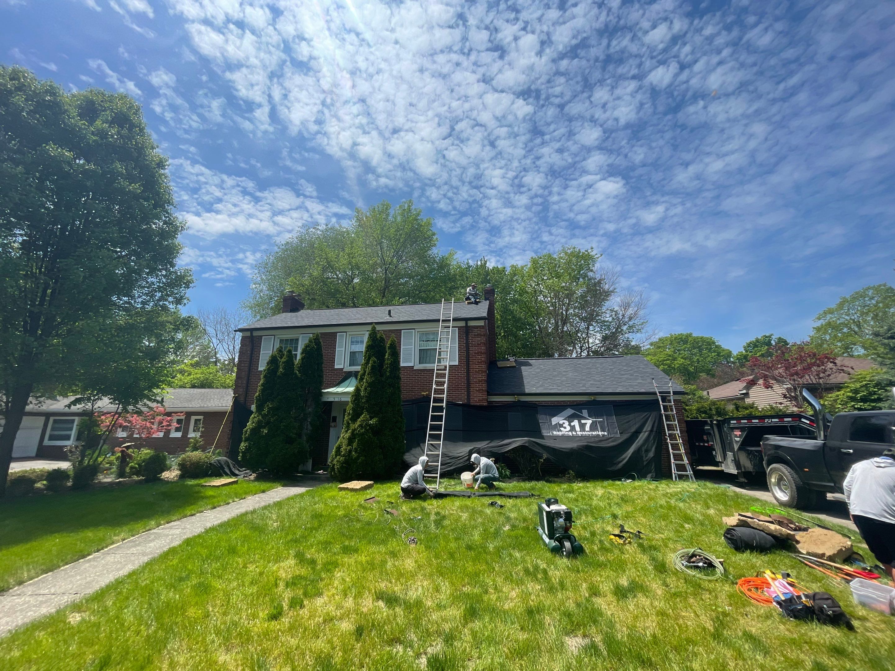 Oakridge Onyx Black and Black Gutters by 317 Roofing & Restorations