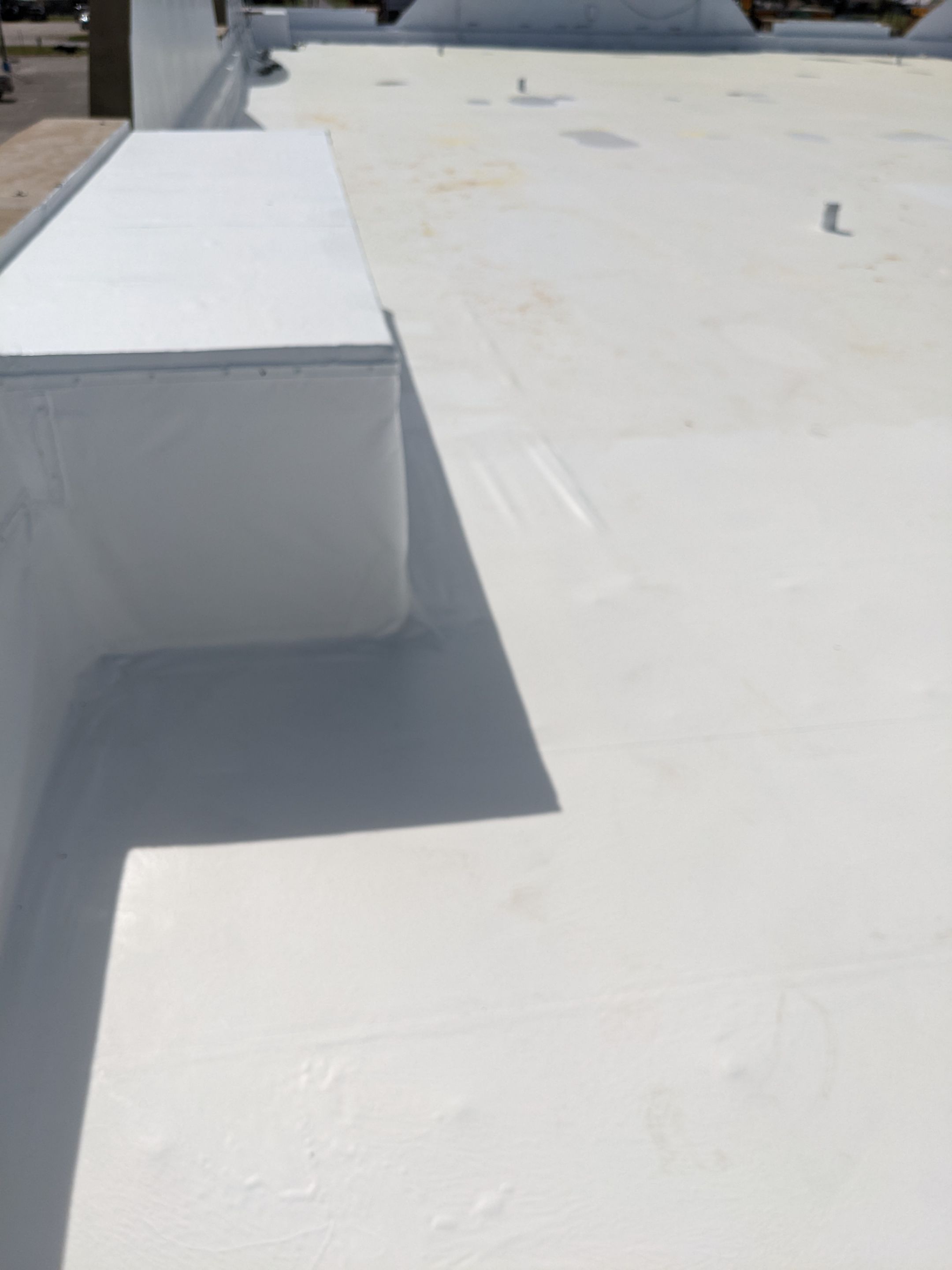 Commercial Roofing Installation using Aldocoat Coatings by Hostetler Roofing