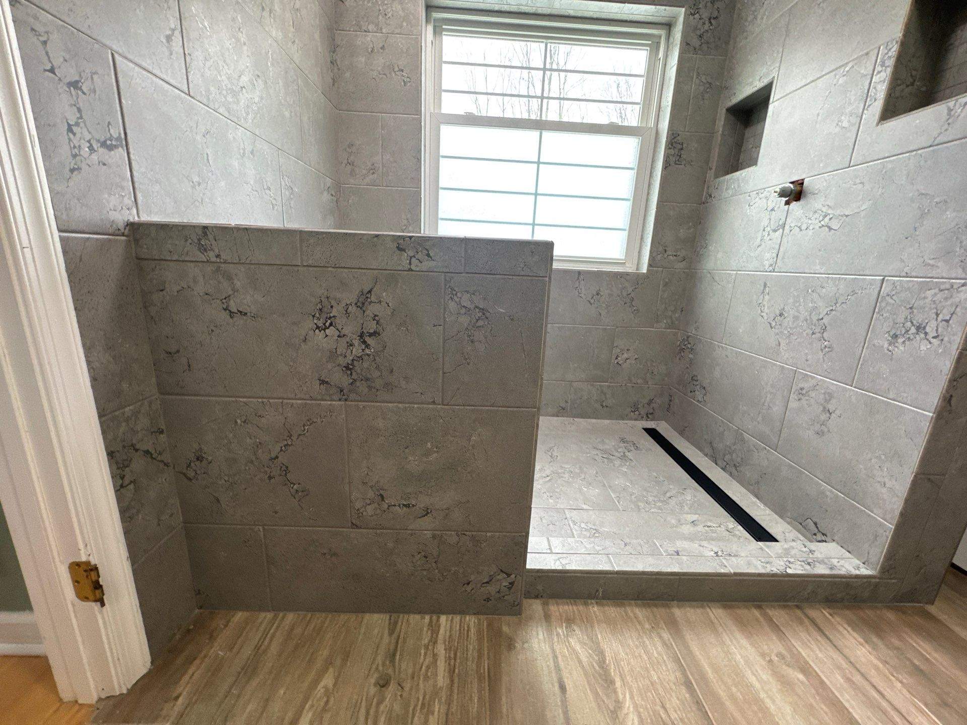 Burns/Olsen Shower Remodel by Integrity Tile and Home LLC