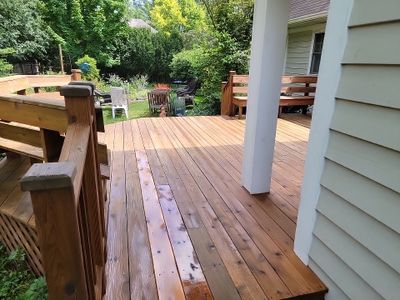 Wood deck cleaning, board replacement and staining