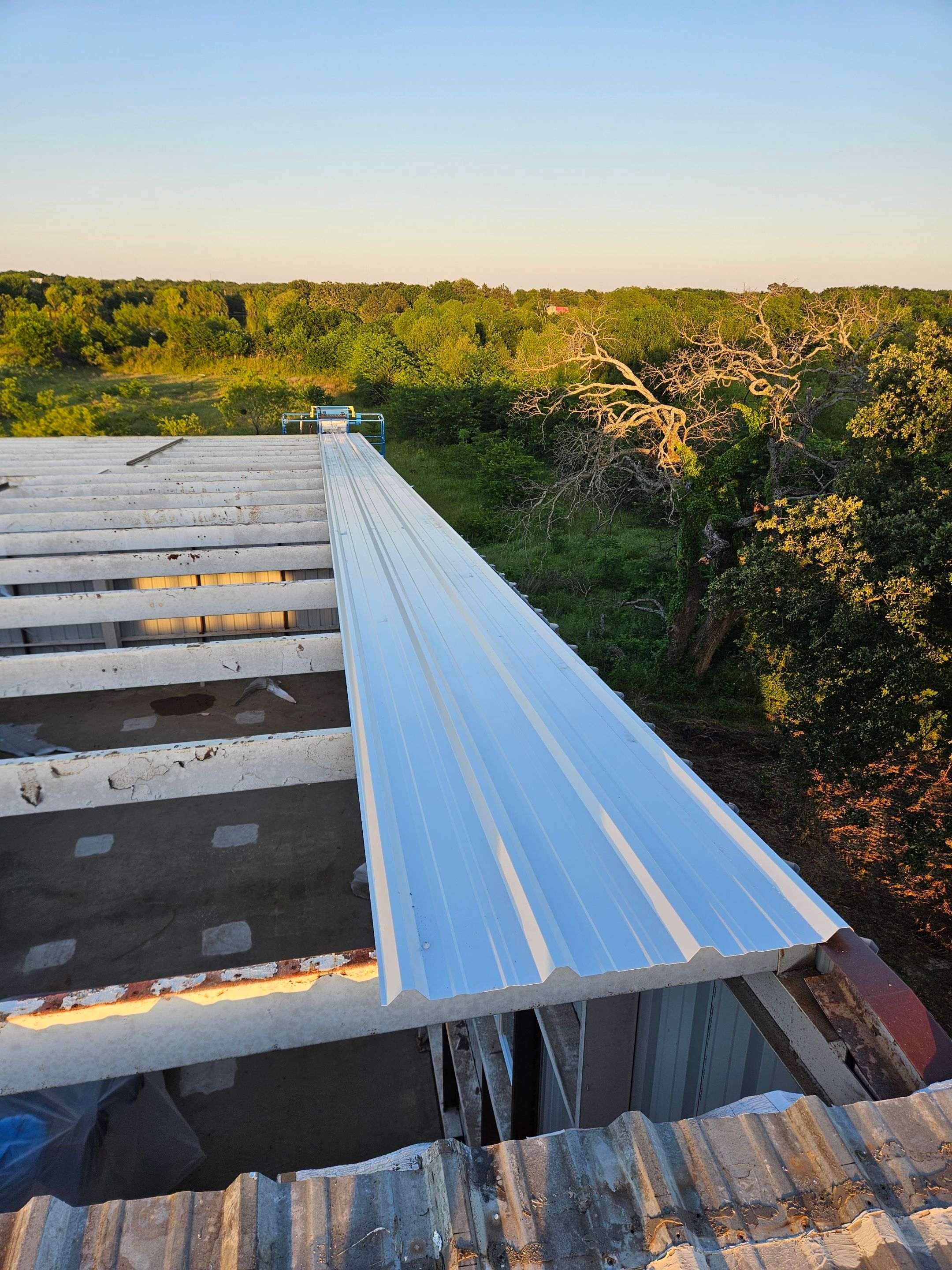 Complete Restoration with Skylight/Window Install - Greenville, TX by Hostetler Roofing