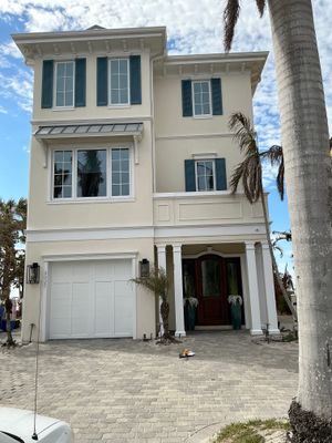 White Seamless Gutters and Downspouts in Longboat Key FL