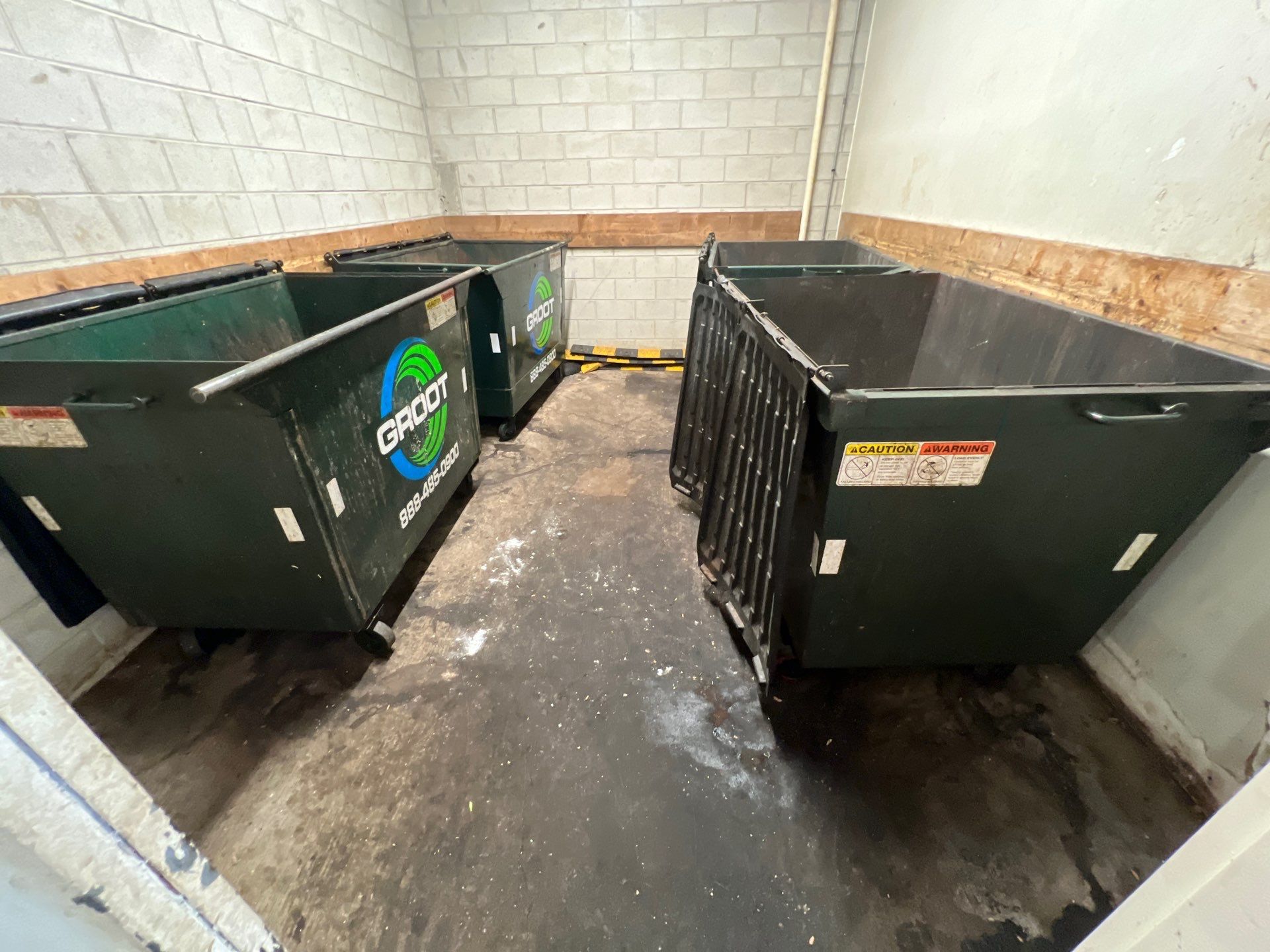 Parking garage using Hot water by Northern Power Washing LLC.