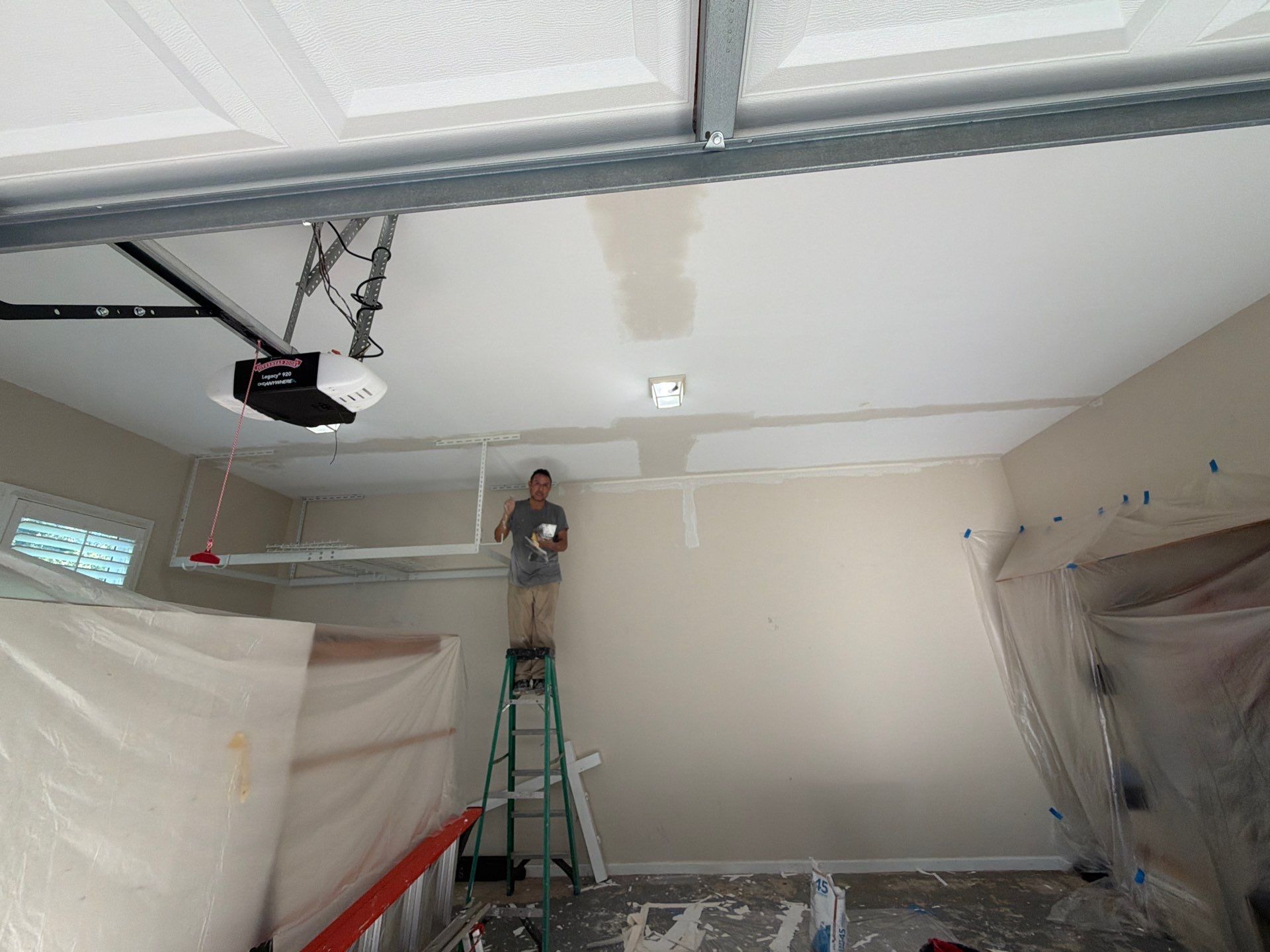 Multi-Story Stucco Home Exterior Painting and Garage Refresh in Marietta by Swift Home Renovations 