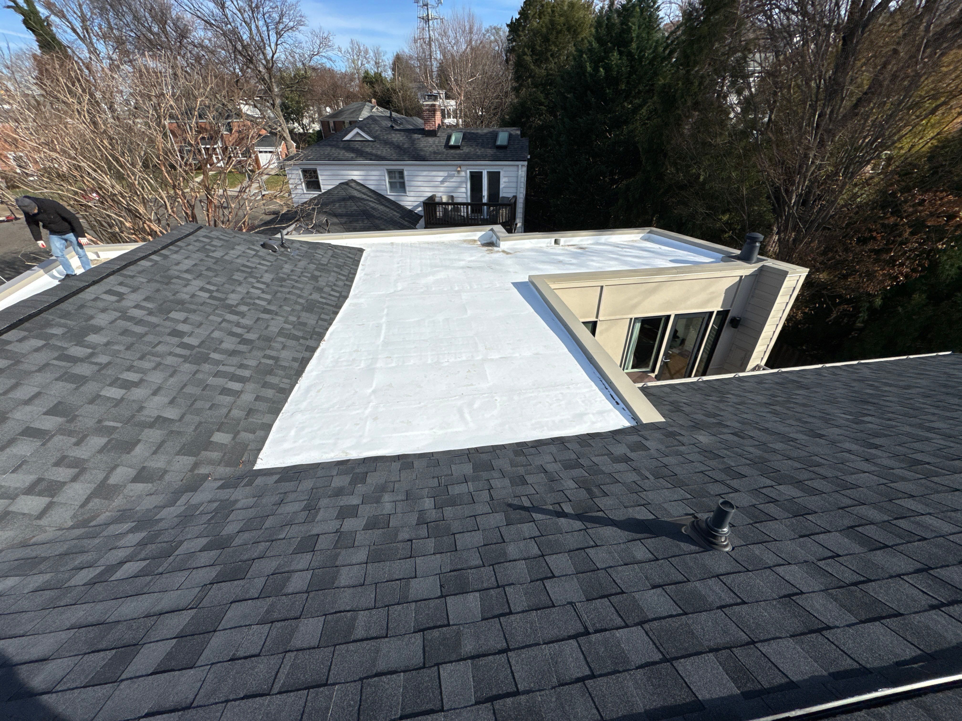 Residential Roofing Installation using Shingle and Flat Roof Combo by USA Storm Roofing and Construction Group