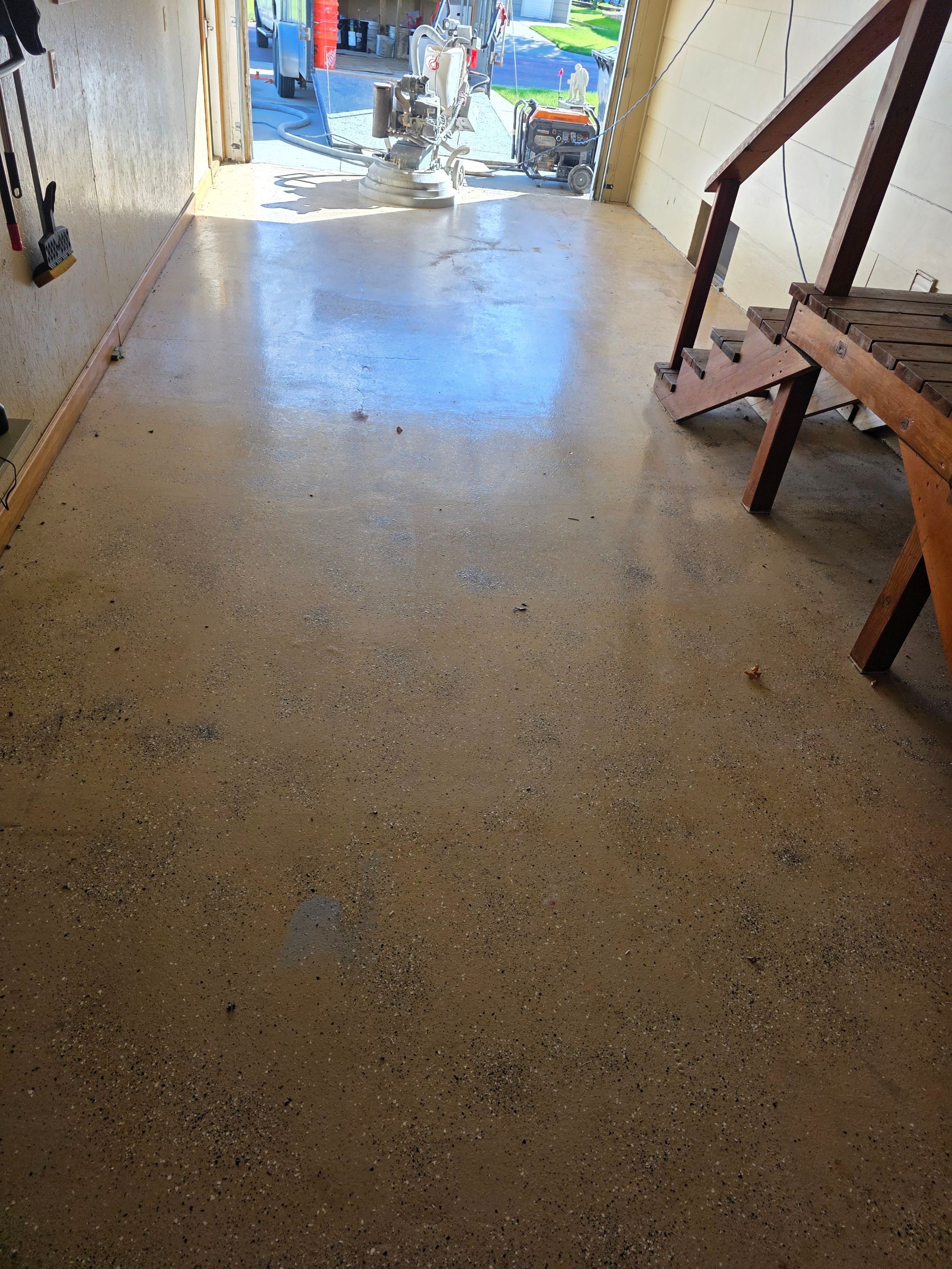 Full Garage and Basement Epoxy Floor Coating in Winner by Select Painting, Coatings & Garage Cabinets