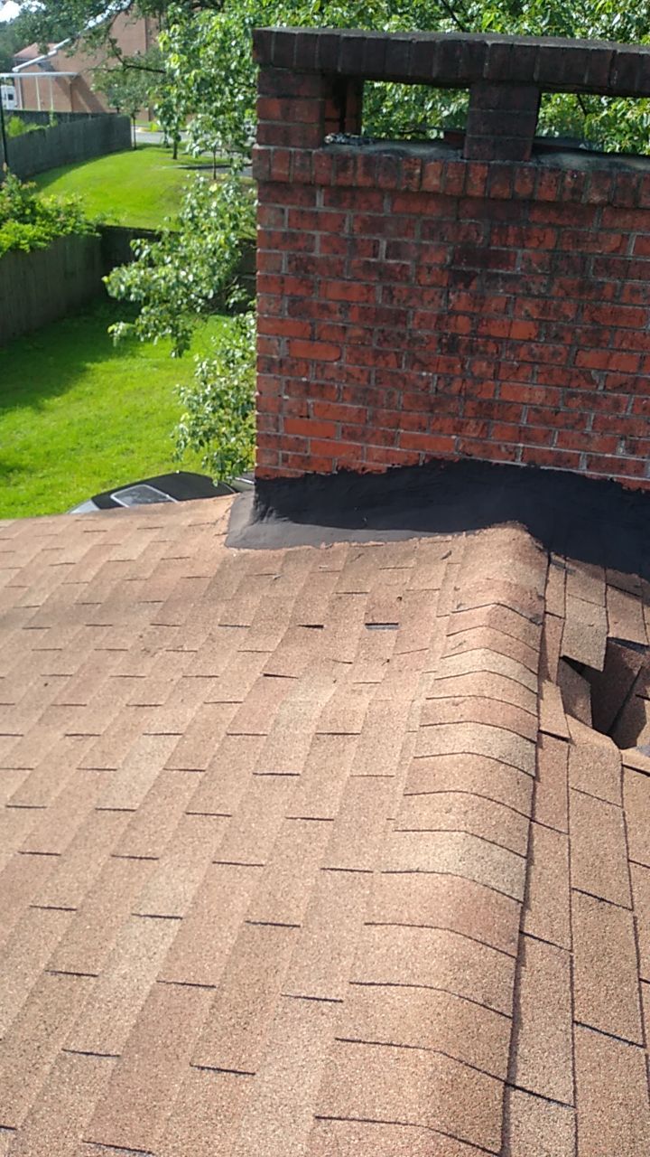 Residential Roofing Installation using Roof Replacement by American Roofing & Construction LLC