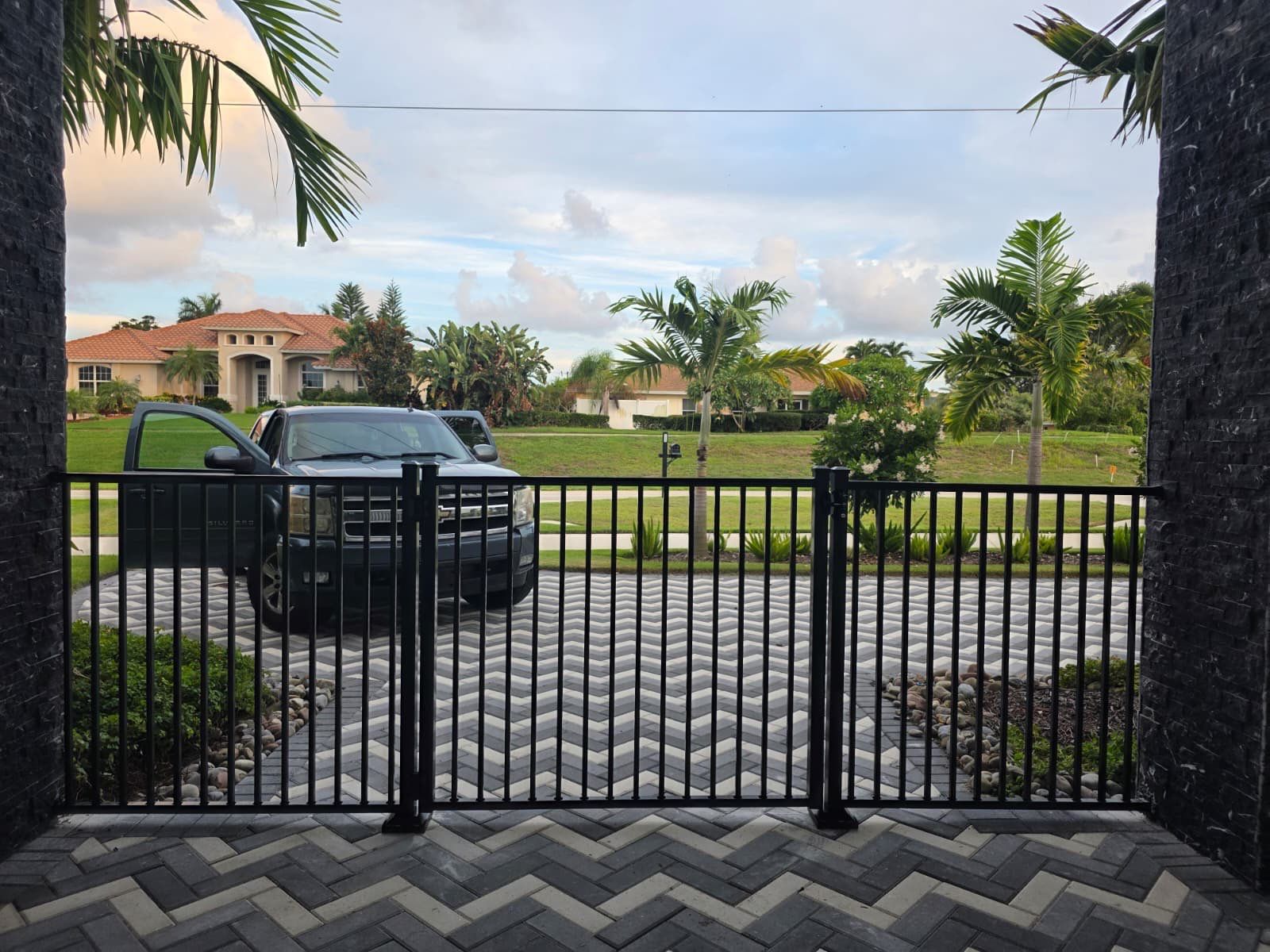 Marco Island Waterfront Vinyl Privacy Fence and Aluminum Railing by True Fence LLC