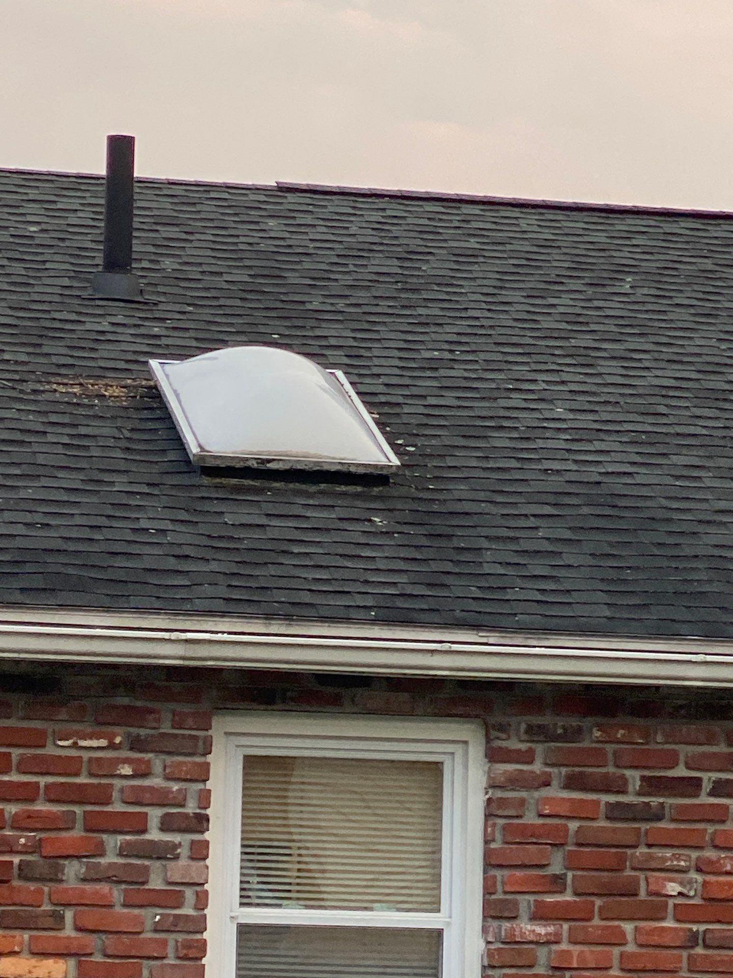Lowell Premium Velux Curb-Mount Skylight & Chimney Restoration by Mighty Dog Roofing of Greater Middlesex County