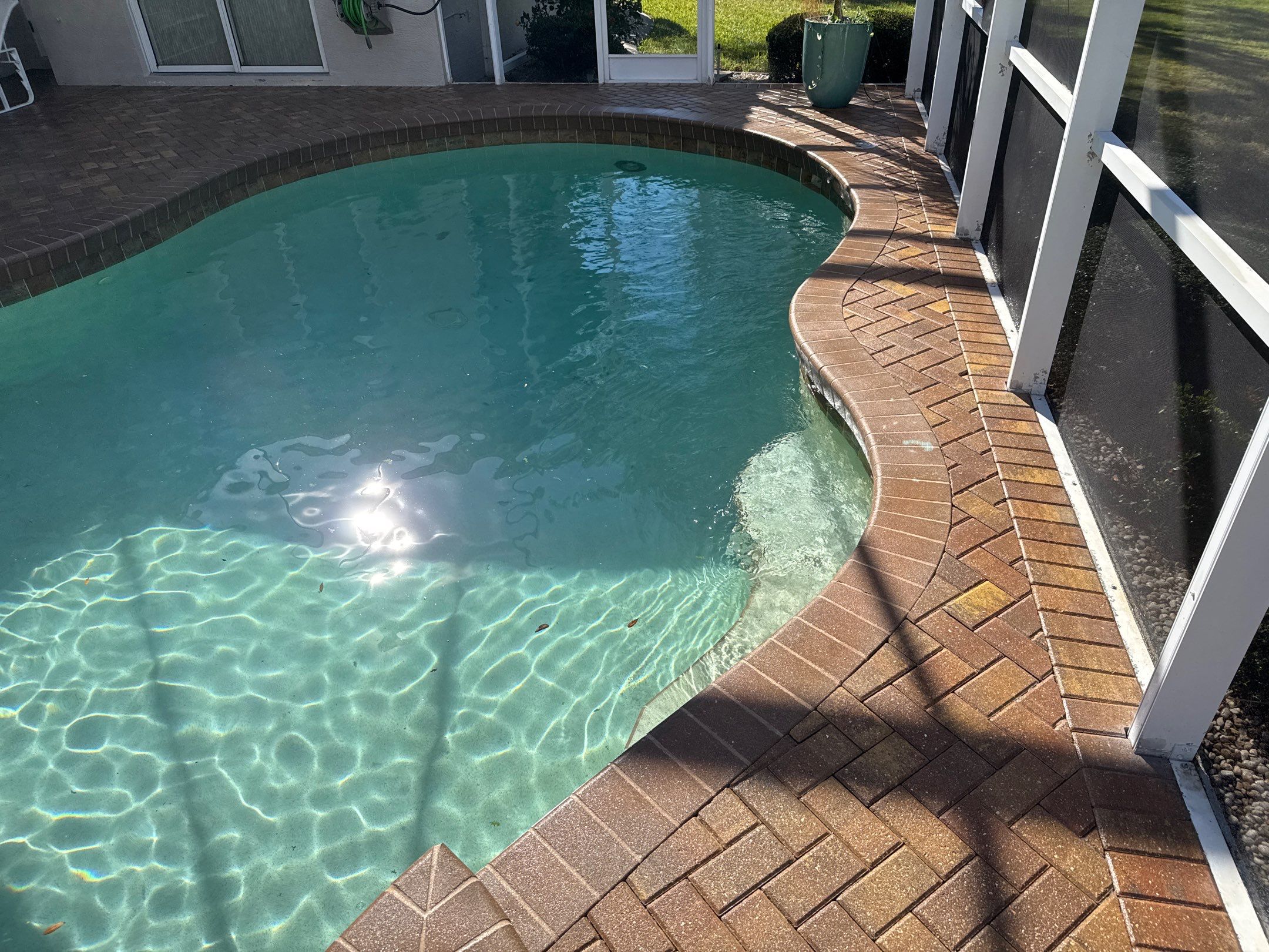 Paver Pool Deck and Screen Enclosure Cleaning in Lakewood Ranch, FL (Rosedale Highlands Community) by Sunshine AquaWash