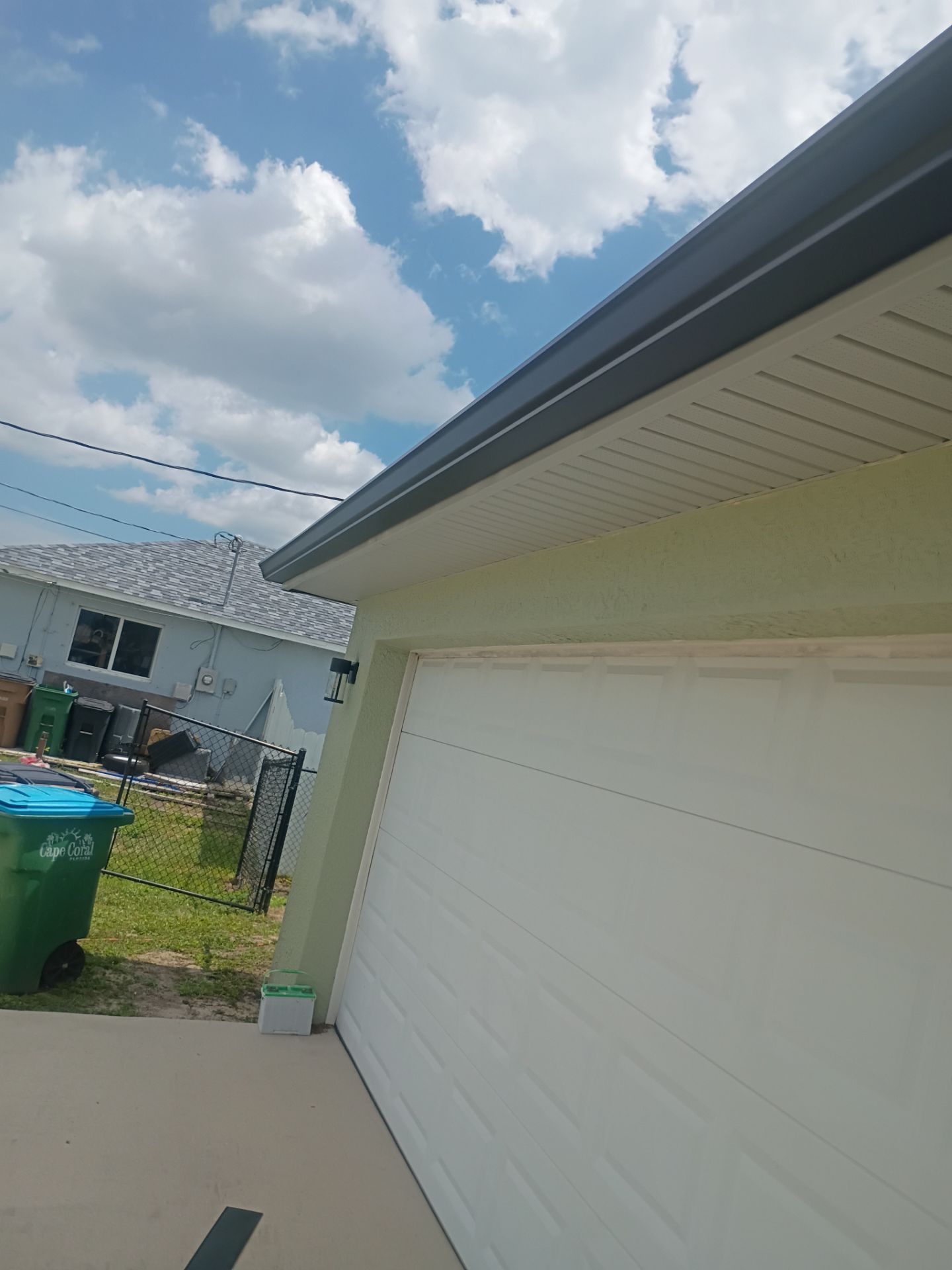 Black Seamless Gutters using K-Style Seamless Gutters in Cape Coral FL by Gutter Professors