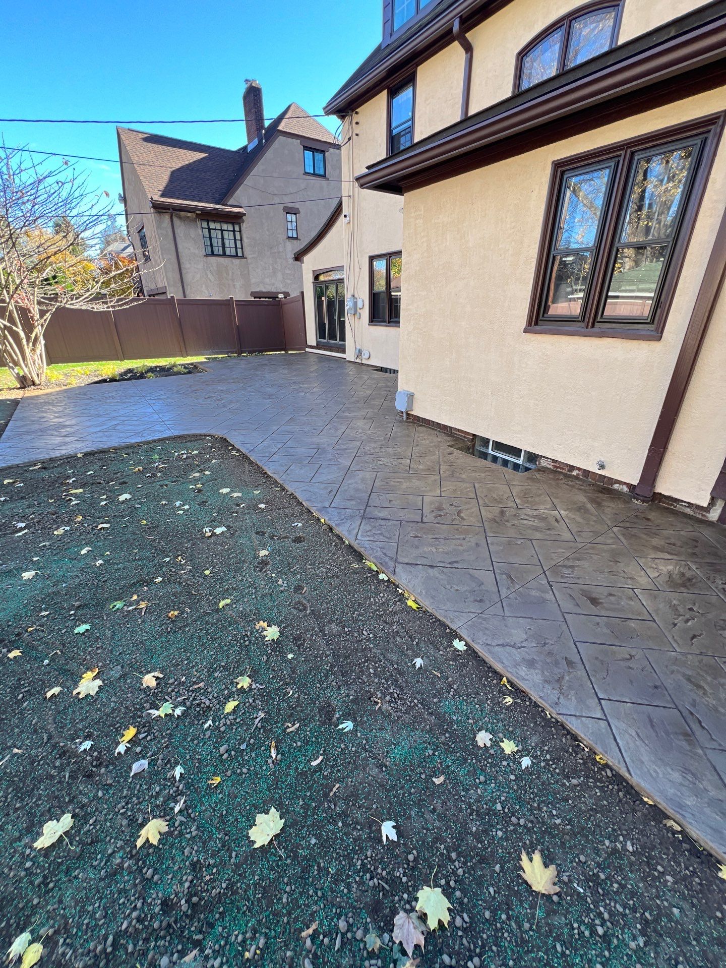 Majestic Ashlar stamped concrete patio  by NG Masonry & Construction LLC