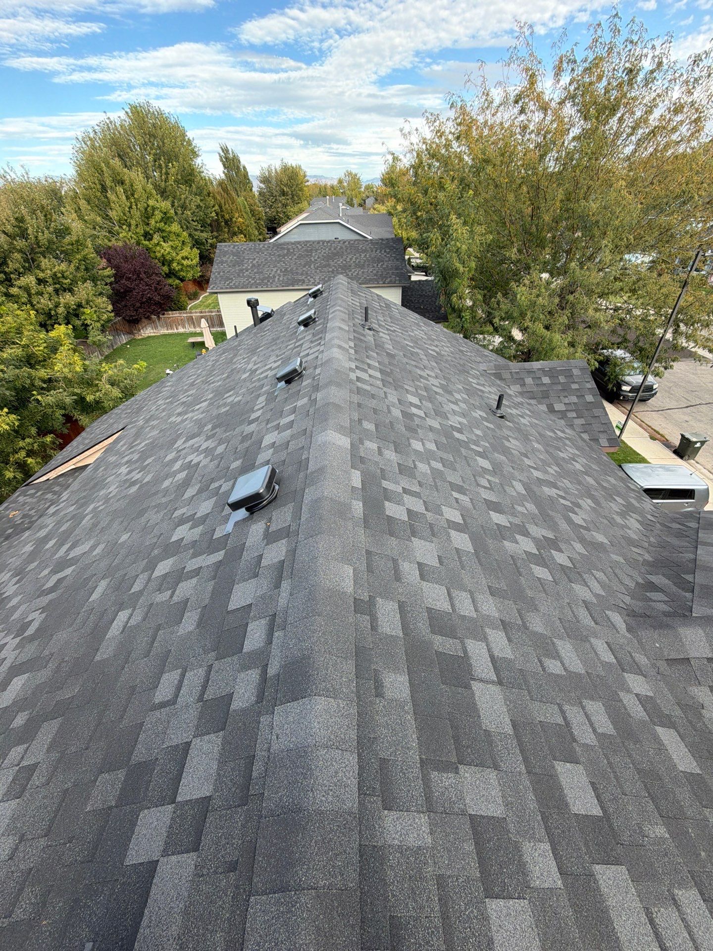 Residential Roof Replacement in Meridian Featuring Charcoal Architectural Shingles by Olive Roofing