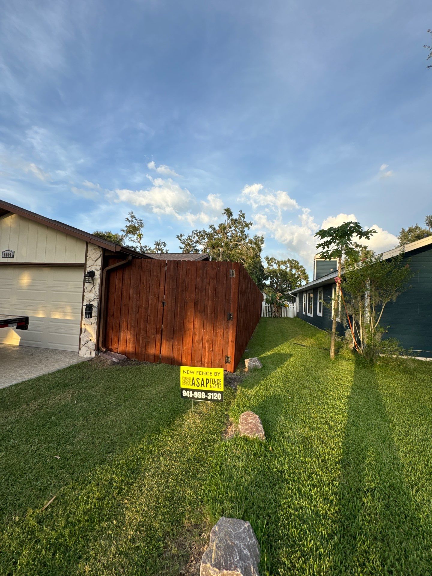 Wood Fence Installation using Pre-stained Pine Board On Board by Asap fence and gates, LLC