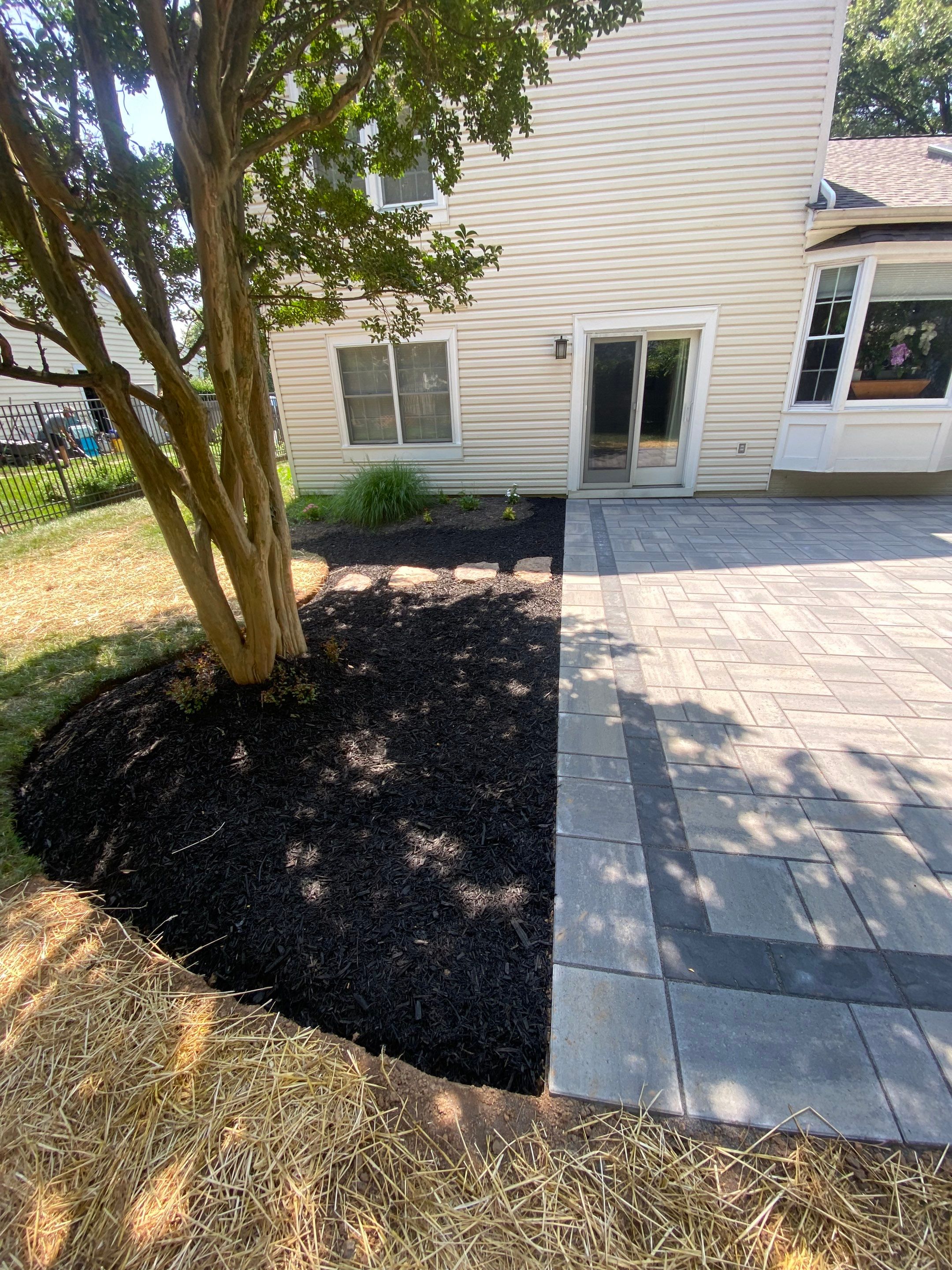 Backyard Transformation using Techo-Bloc Pavers by The Smet Companies, LLC