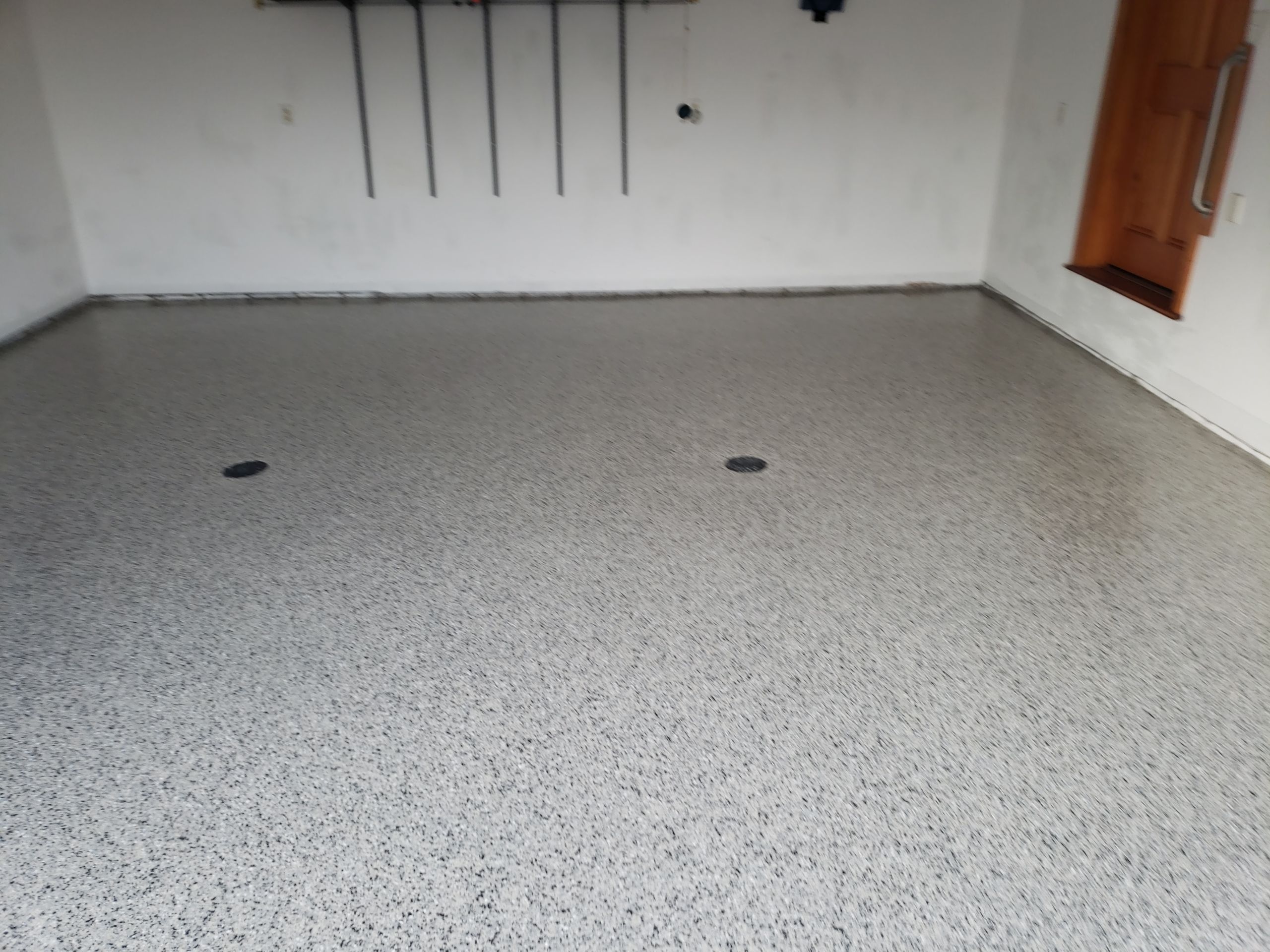 St. Joseph -- Front Patio and Garage Epoxy Garage Coating System by Big Red Decorative Concrete, LLC