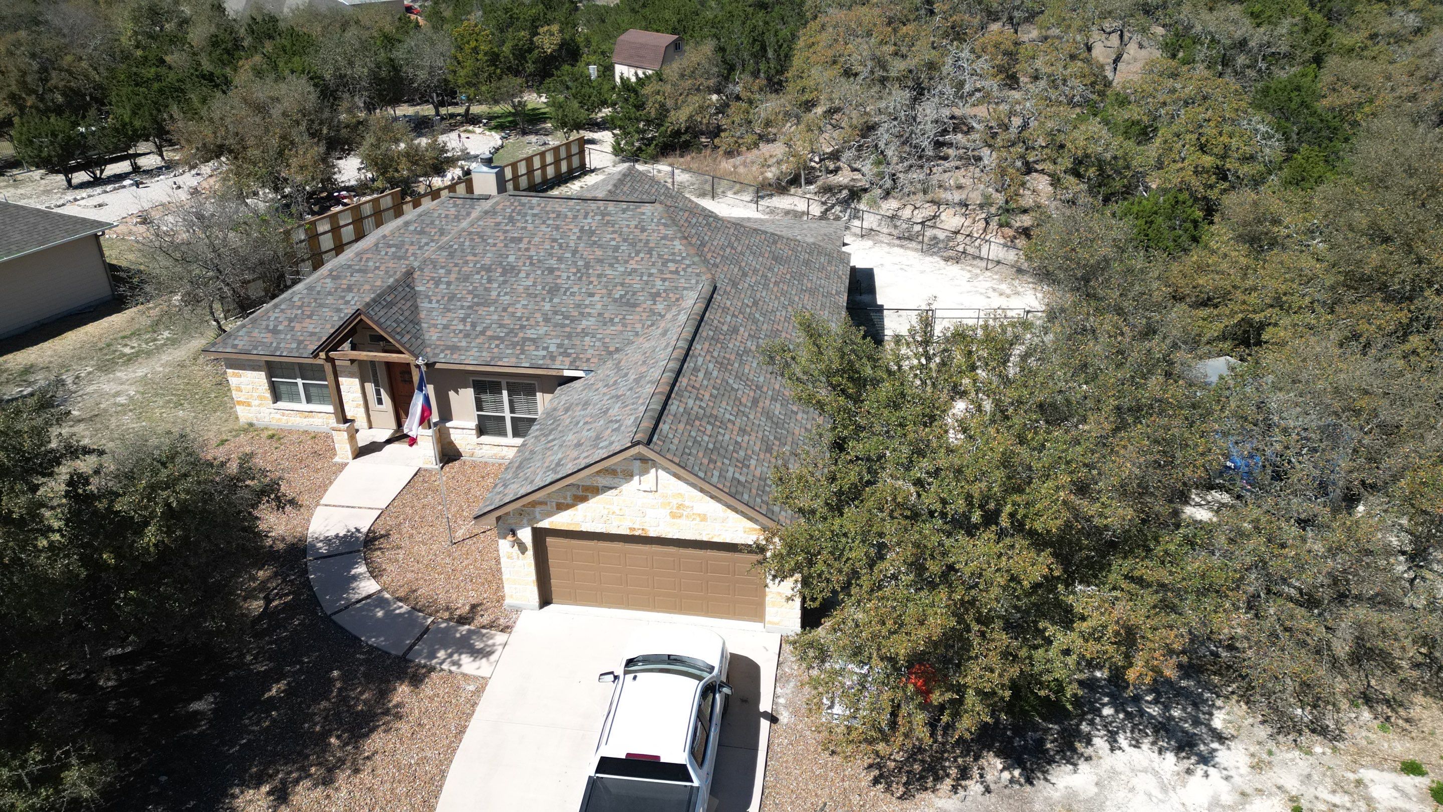 Reroof with Back Patio Addition using Owens Corning Duration Aged Copper by Lightning Exteriors