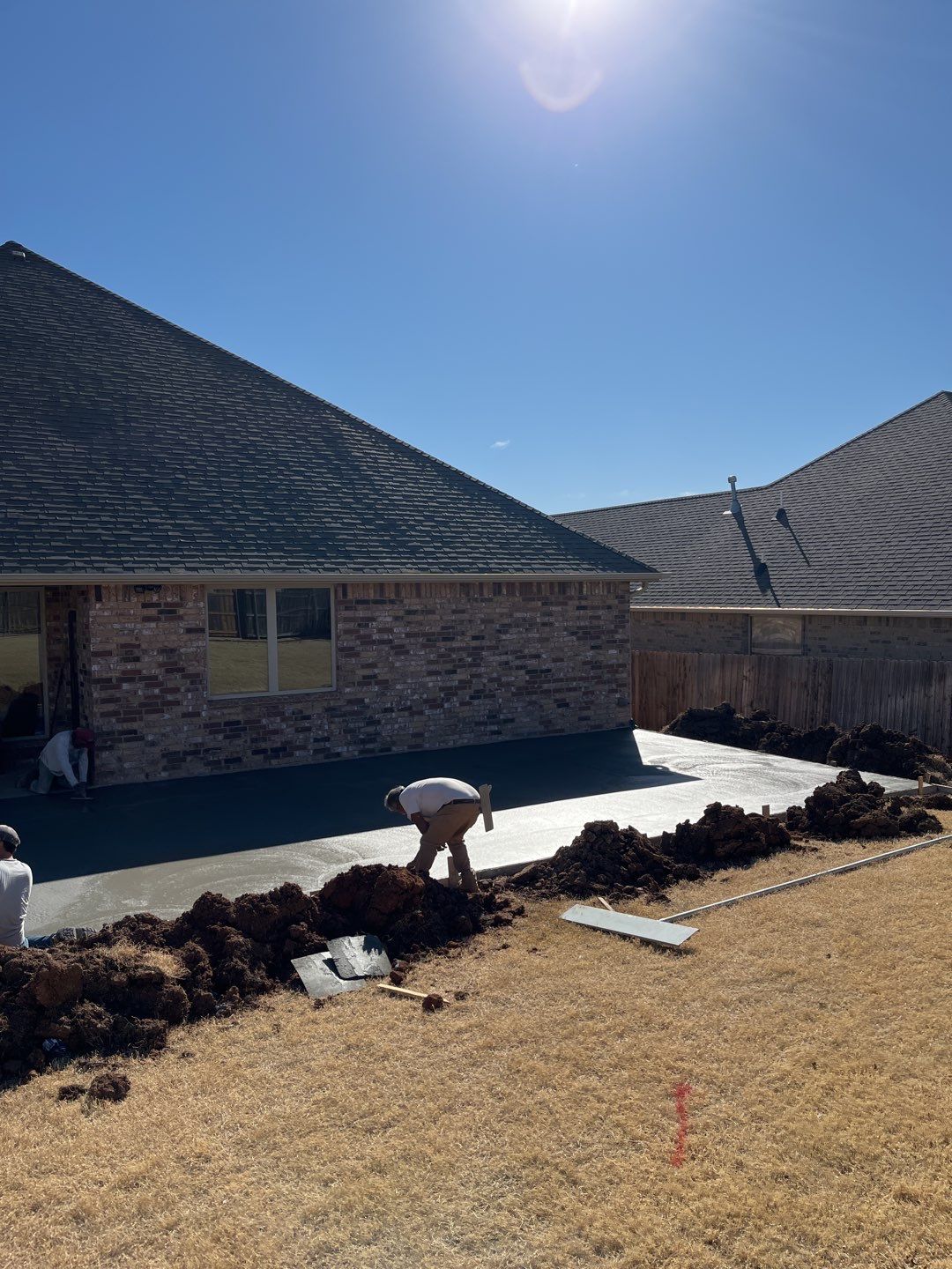 Concrete Slab , Retaining Wall , Fence, and landscape. by Clays Services Inc