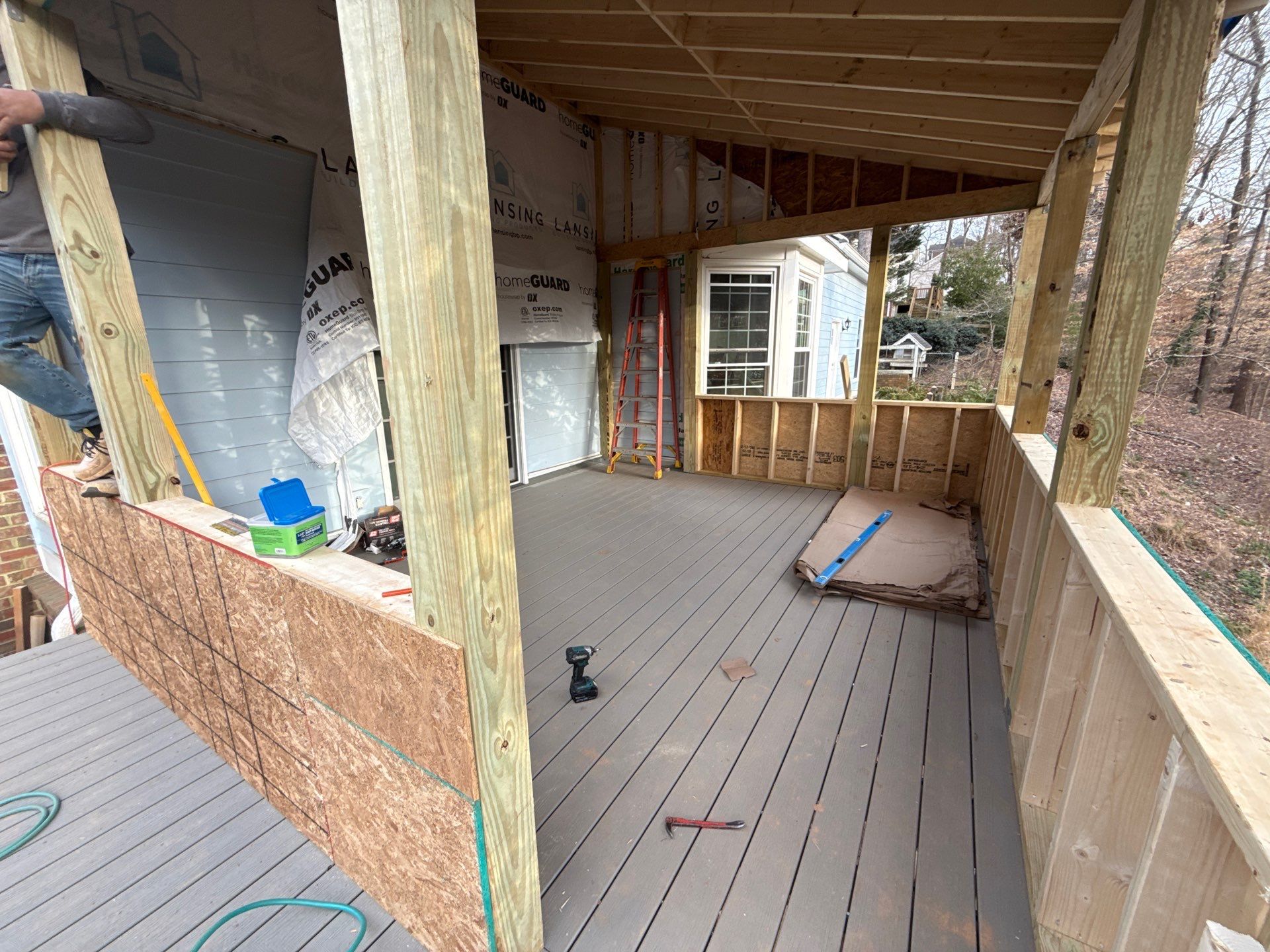 New deck with screened in porch by Nelson Exteriors 