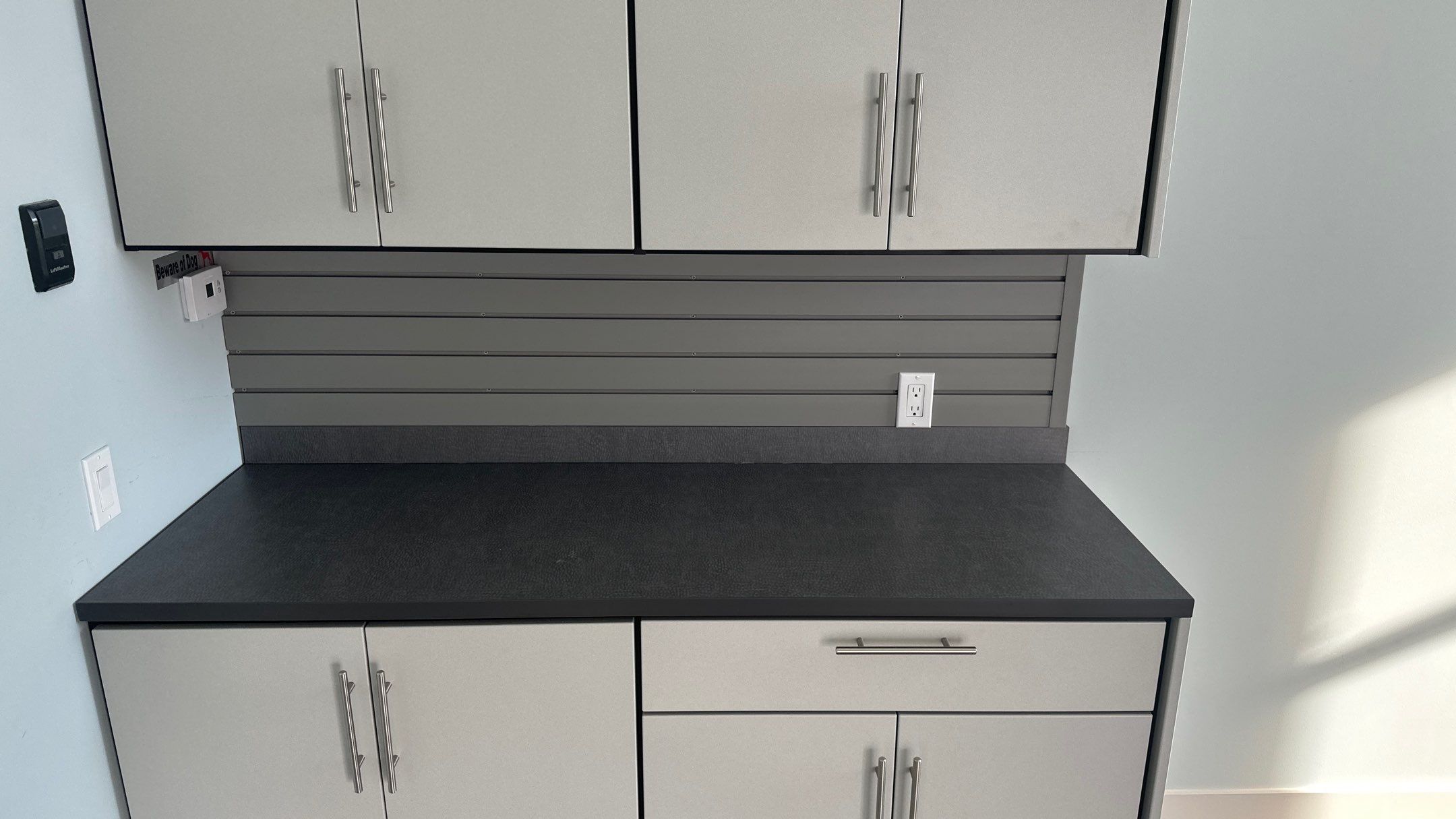 Bryon V. upgrades garage with cabinets and heavy duty slatwall by Banner Garage