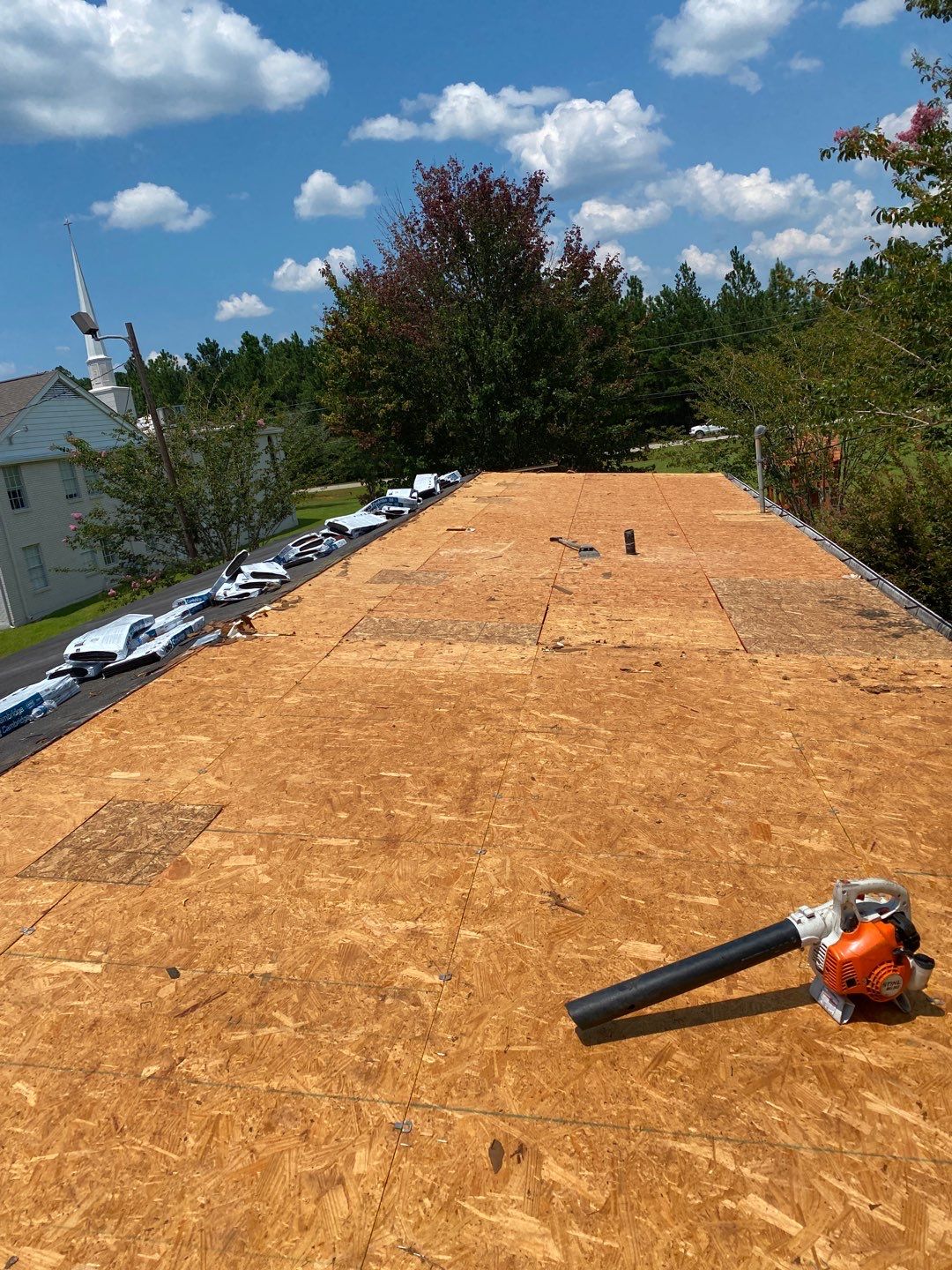 Commercial Roofing Installation using Roof Replacement by American Roofing & Construction LLC