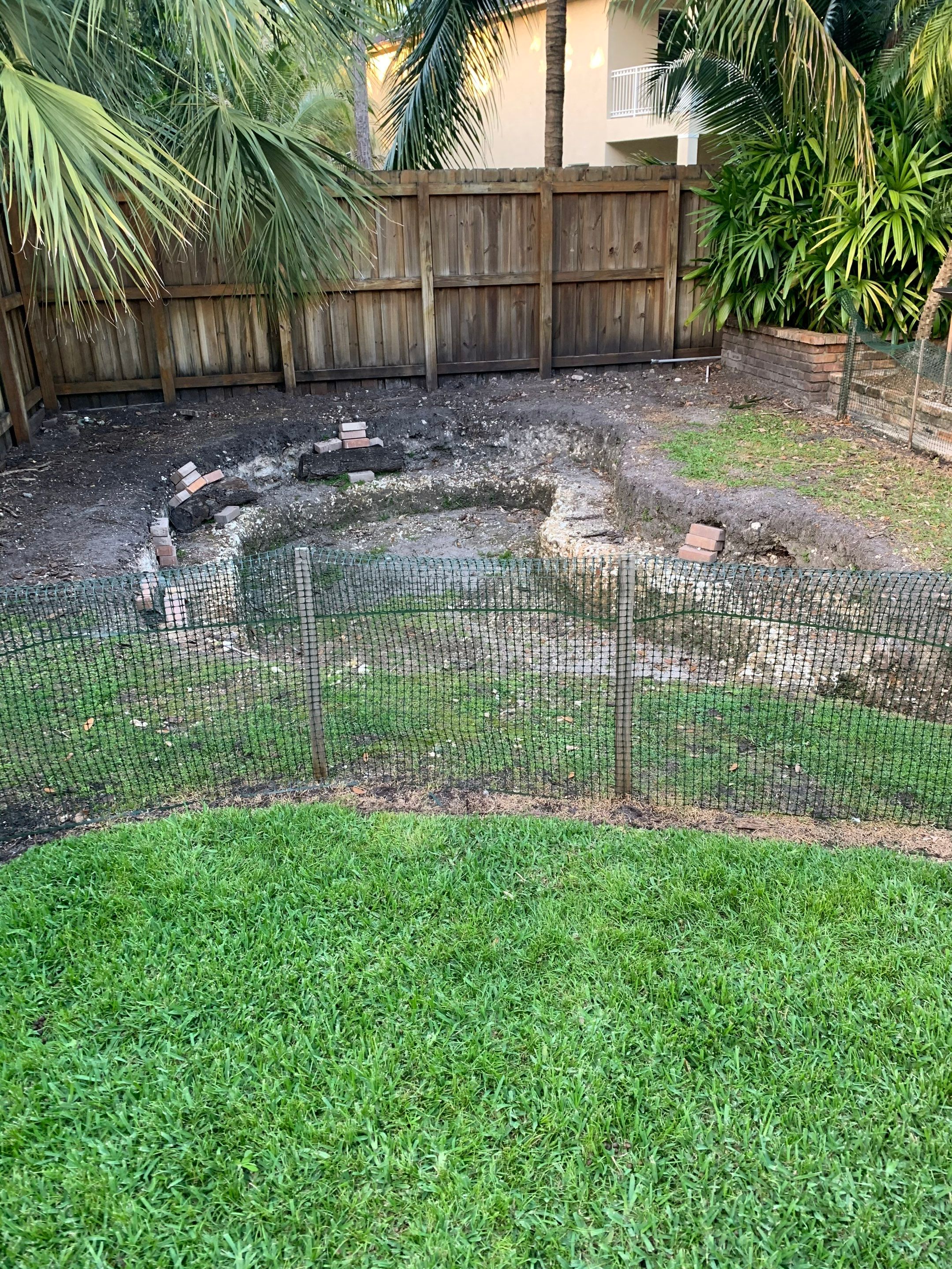 Small Koi Pond by Nature's Dream Landscape and Tree Service
