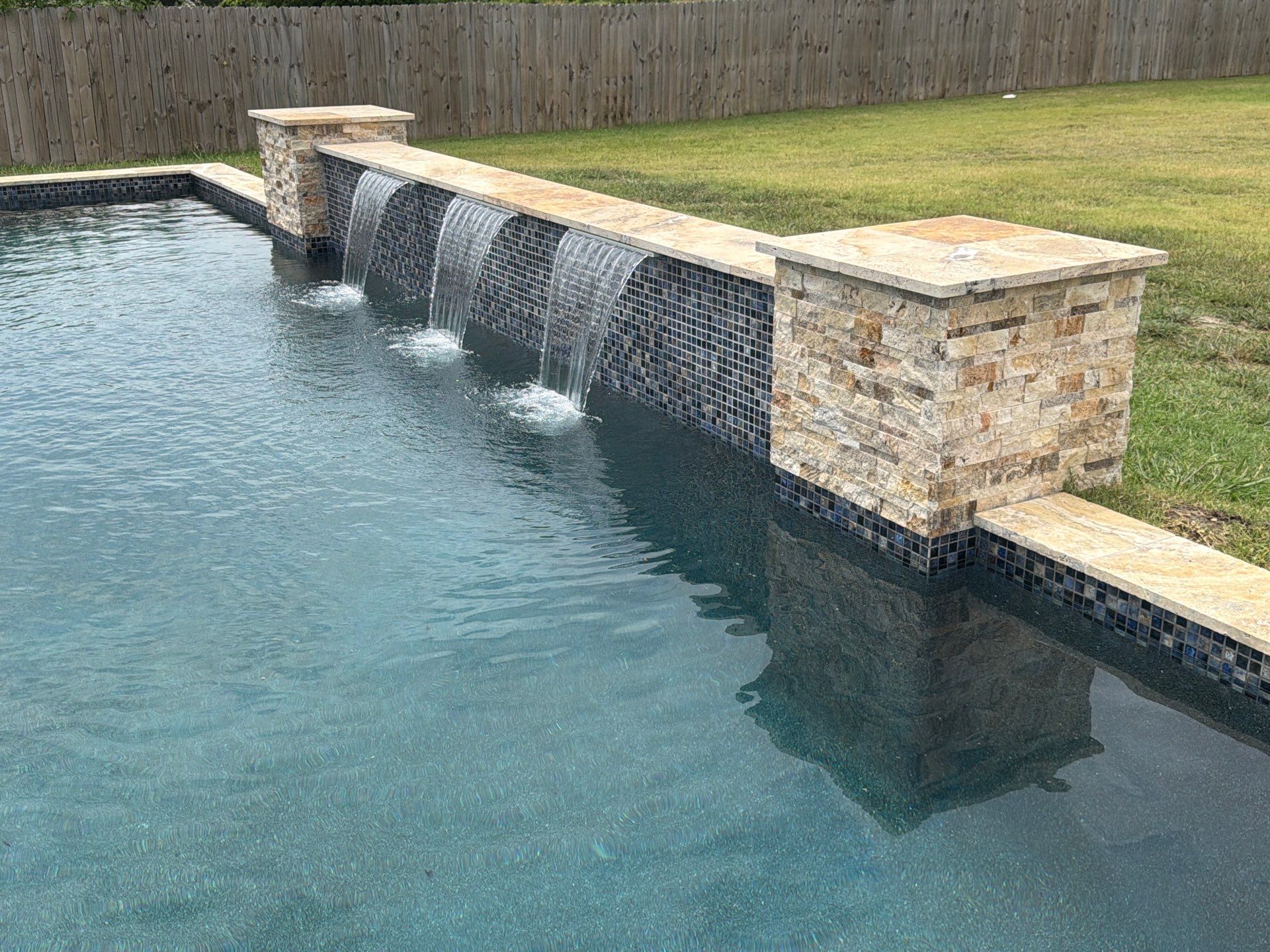 Modern Geometric Pool with Spa and Sheer Descent Water Wall by Pinnacle Pools and Spas - DFW