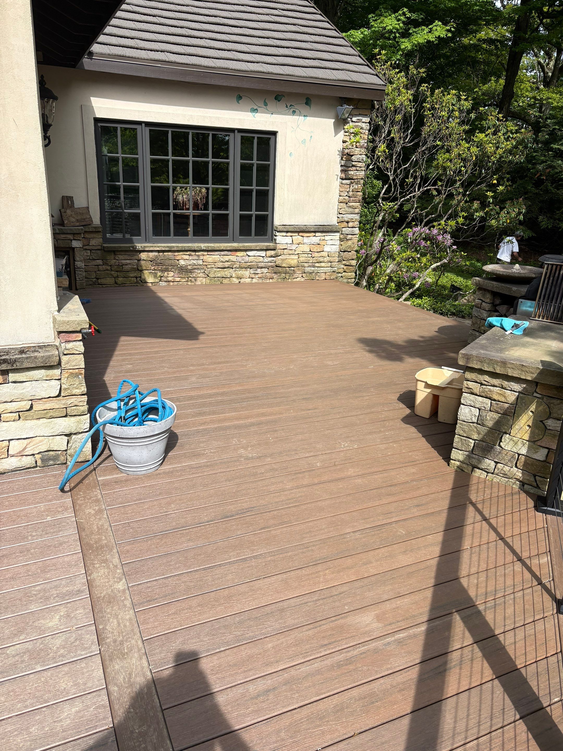 1500 sq/ft Composite Deck Build with Outdoor Kitchen in Champion by Cousins Roofing Siding & Decks