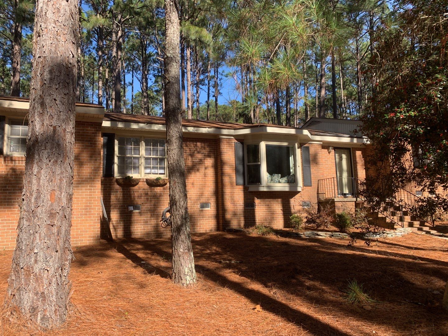 Re Roof by American Roofing NC
