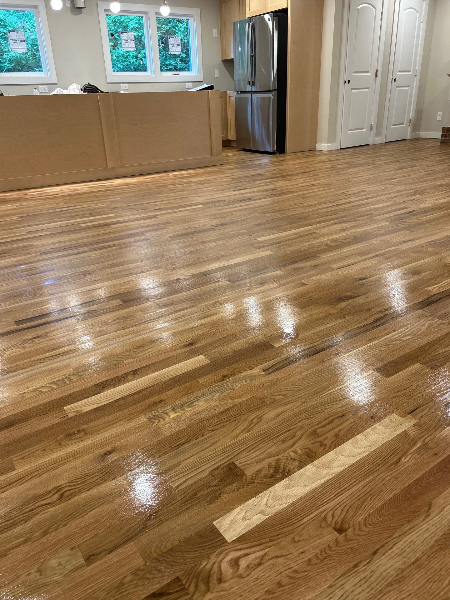 Remodel with existing and new white oak by Footprints Floors of East Atlanta
