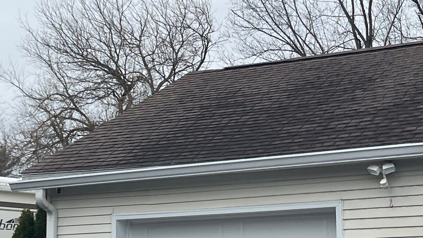 Residential Roofing Installation using Atlas Pinnacle Pristine Black Architectural Shingles by Frederick Roof Repair