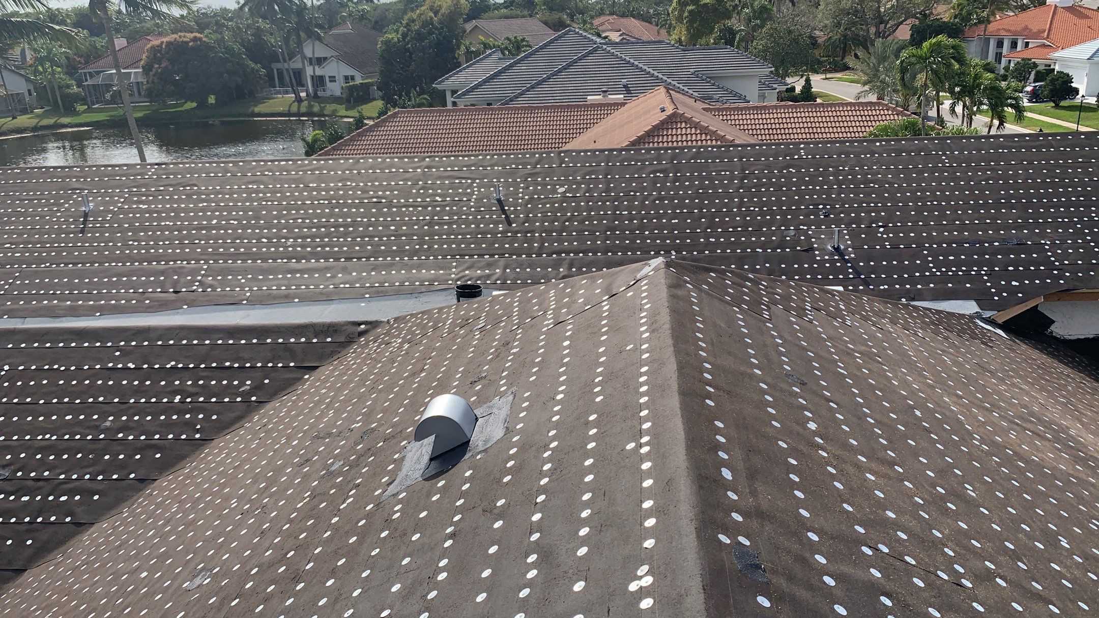 Residential Roofing Installation using 1" Nail strip metal roof by BLUES BROTHERS ROOFING
