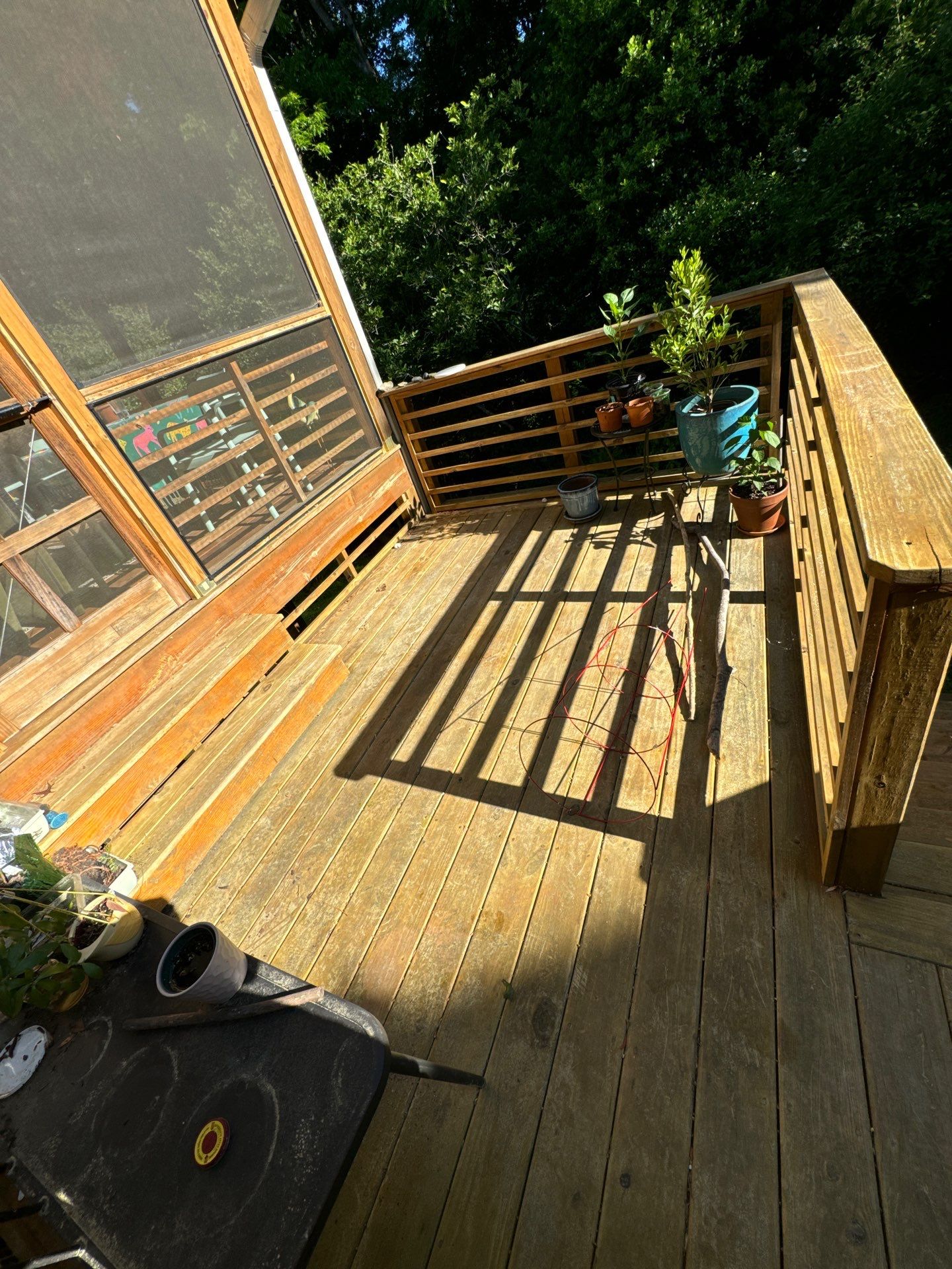 Porch staining by GonzalezPainters & Contractors Inc 