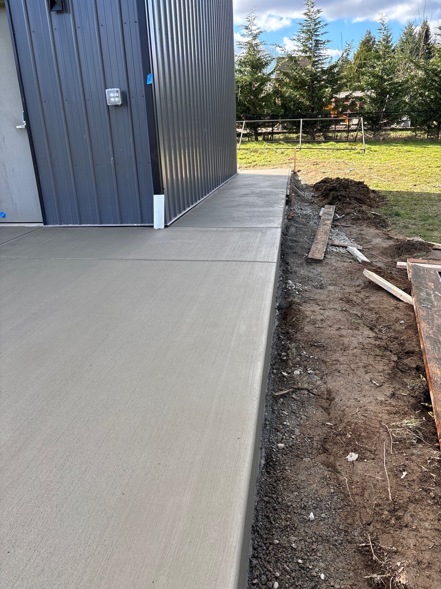 Concrete Walkway Surround and Front Patio | Snohomish  by Jireh Asphalt & Concrete Inc 