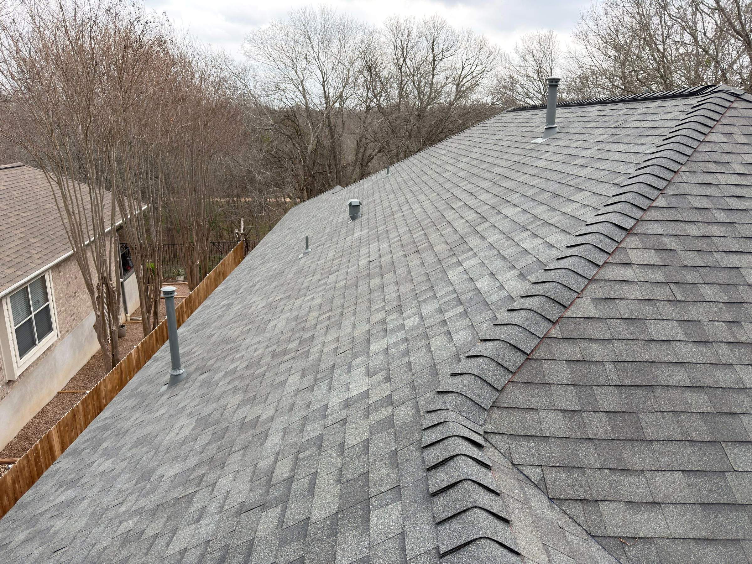Estate Gray Shingle Roof Replacement in Southeast Austin by Skywall Construction LLC