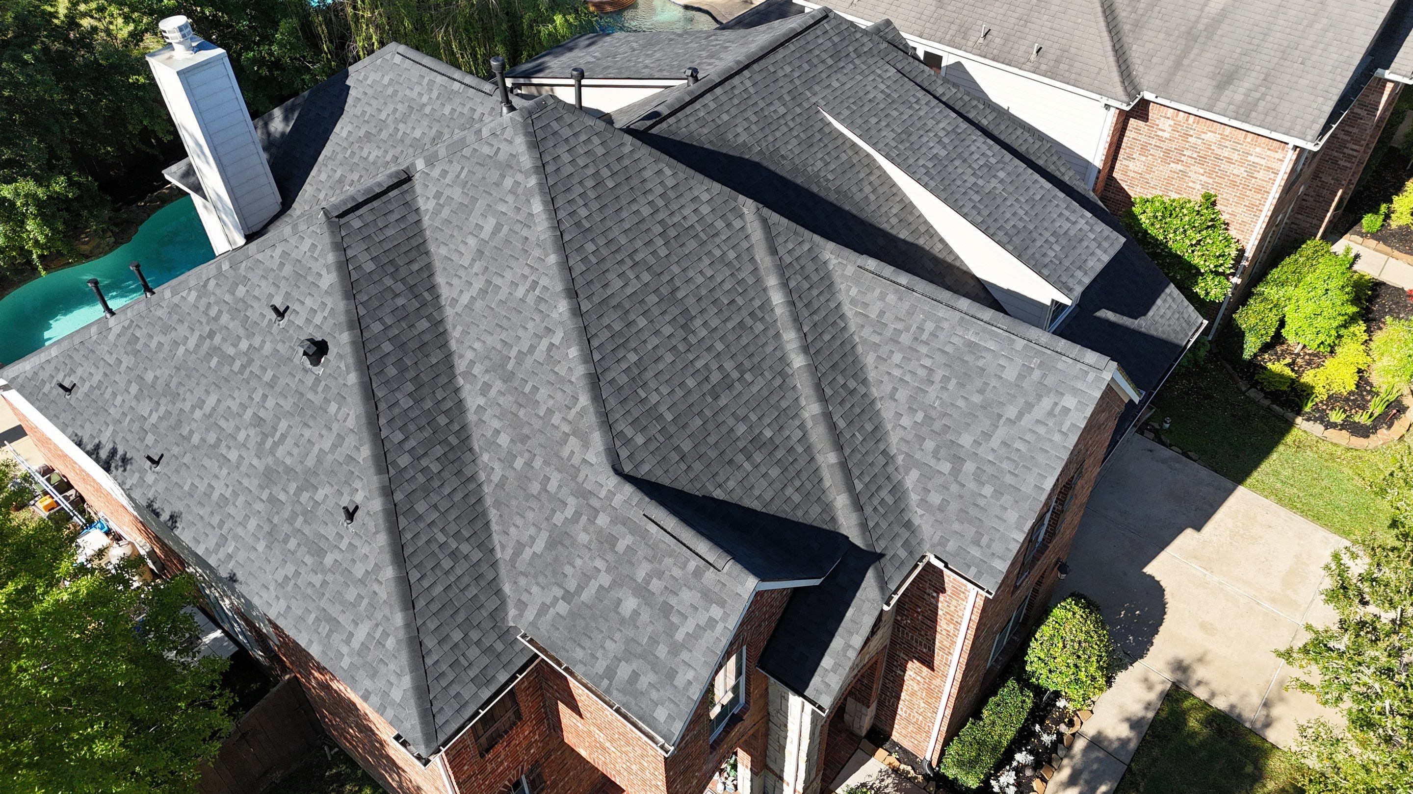 Residential Roofing Installation using Architectural Shingles by Core Four Roofing