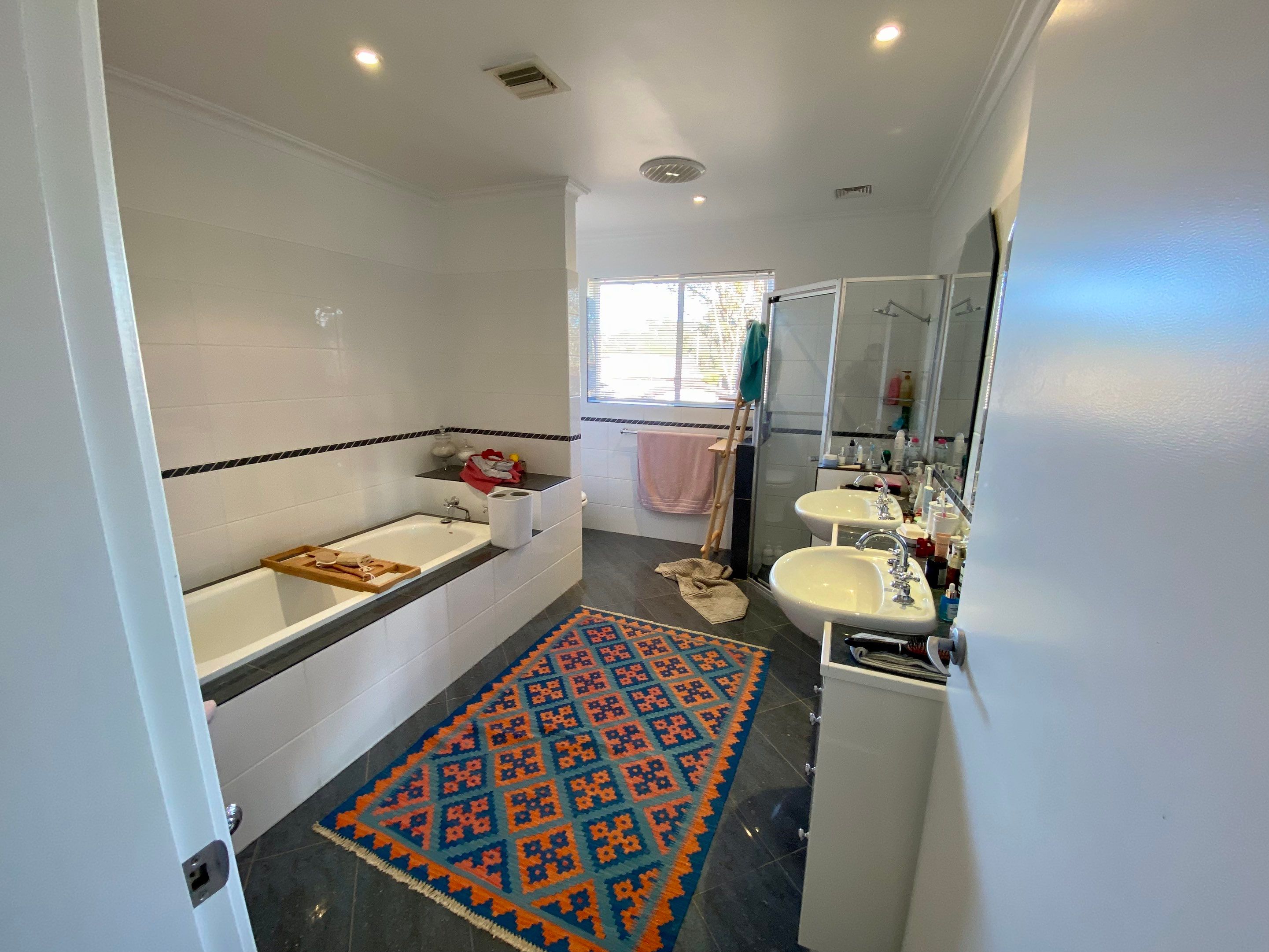 Bathroom Renovation using XROCK 36W White natural 300 x 600 by Re-seal Bathrooms