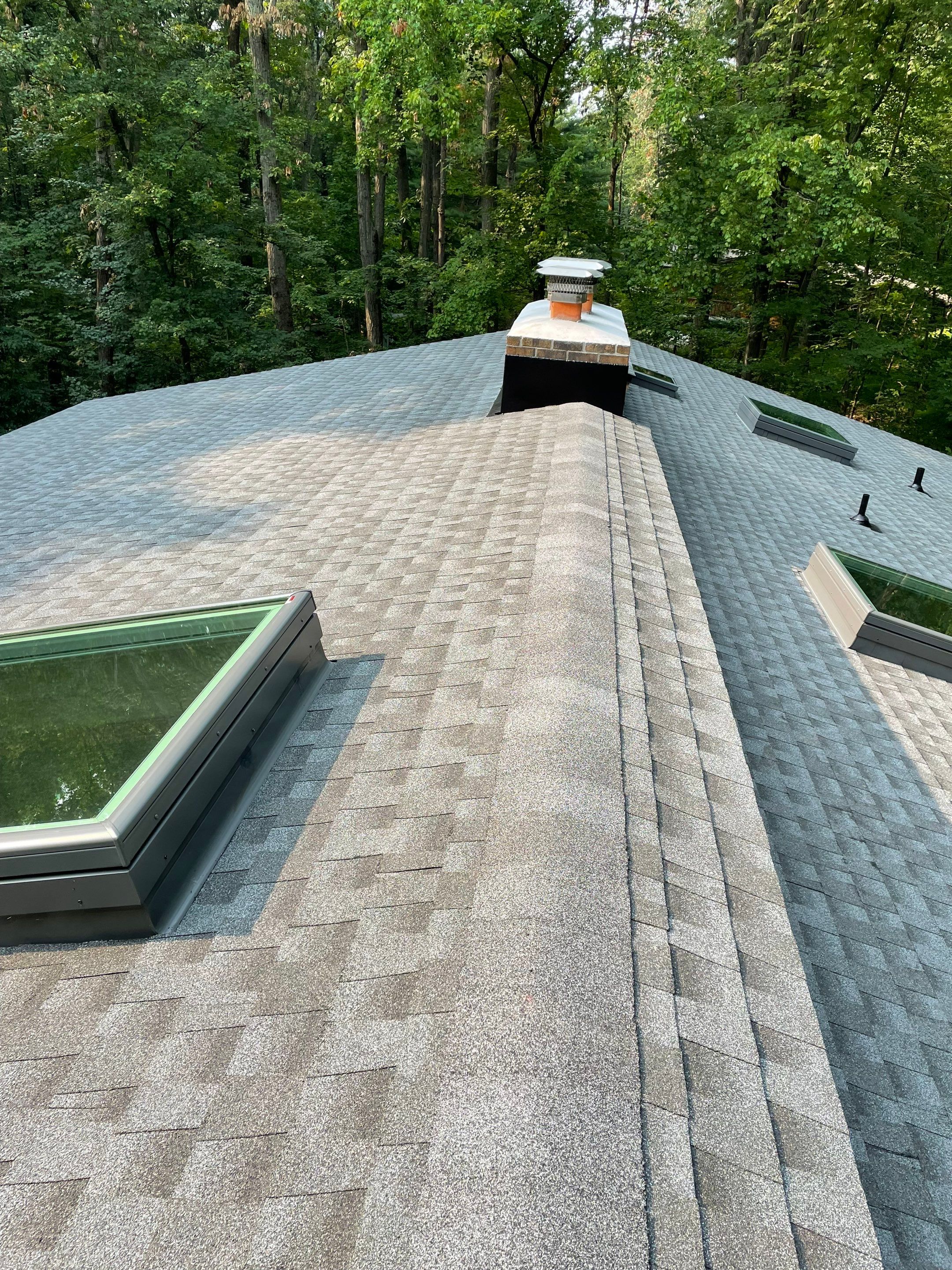 Deckhouse Roof Replacement by American Home Contractors