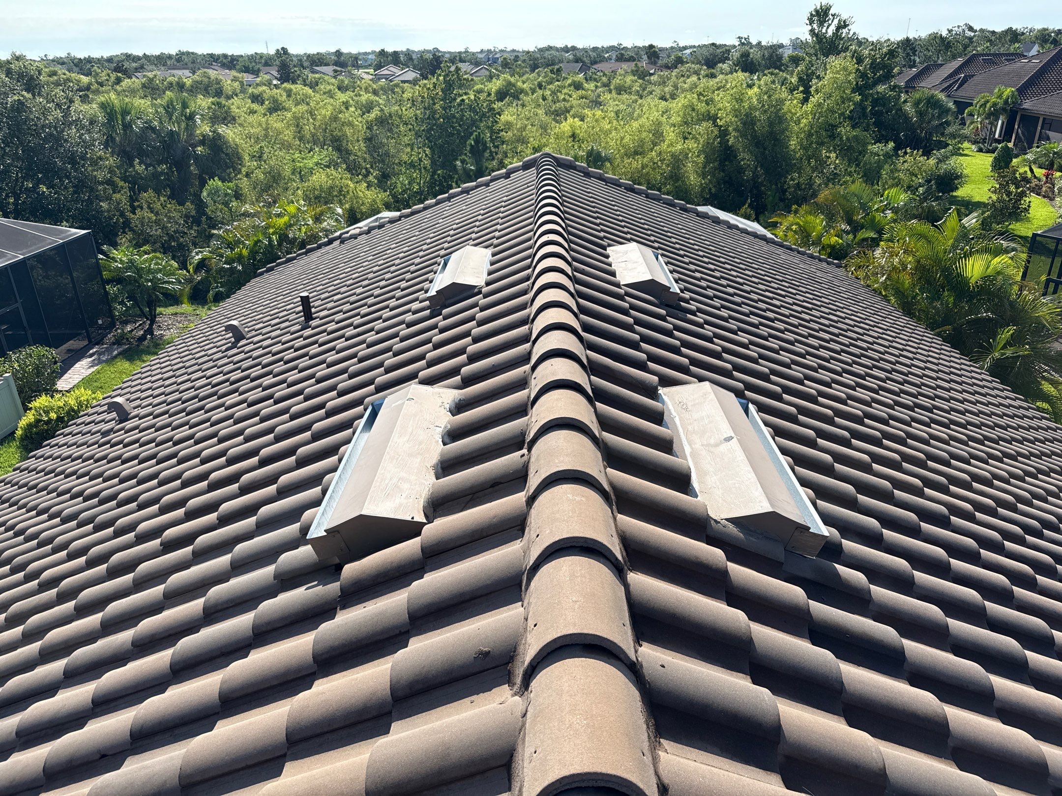 Concrete Tile Roof, Paver Driveway & Lanai Cleaning – Artisan Lakes Esplanade, Palmetto, FL by Sunshine AquaWash
