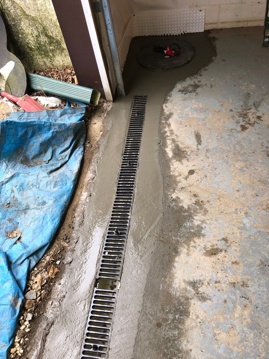 Basement Waterproofing using Drain tile system and a foundation wrap by ACE Waterproofing & Basement Solutions