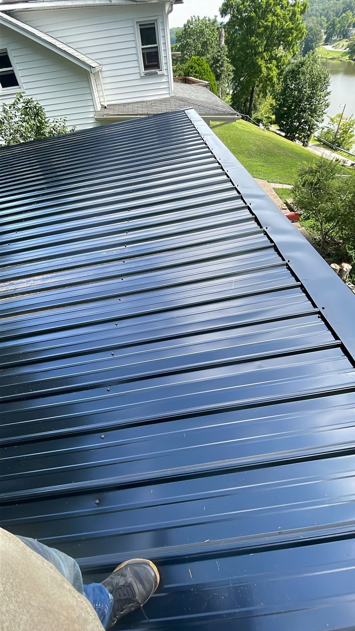 Residential Roofing Installation using Metal by Rainstoppers Roofing