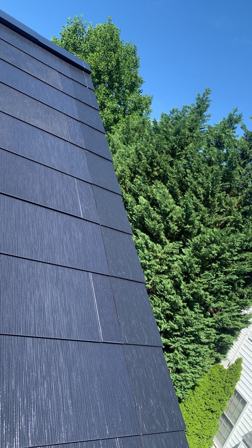 Tesla Solar Roof Replacement using Tesla Solar Roof V3 tiles by American Home Contractors