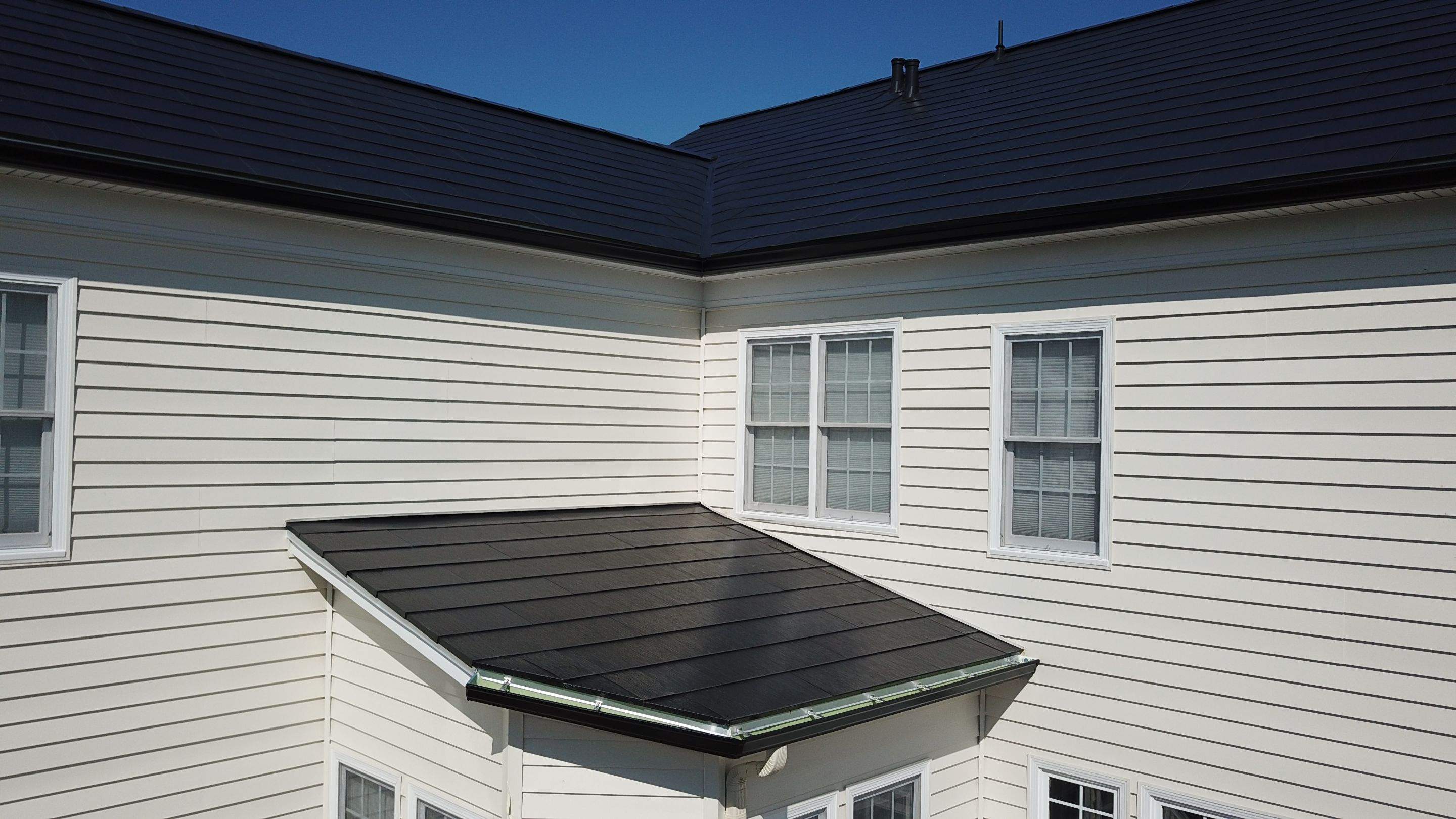 Tesla Solar Roof Replacement using Tesla Solar Roof V3 tiles by American Home Contractors