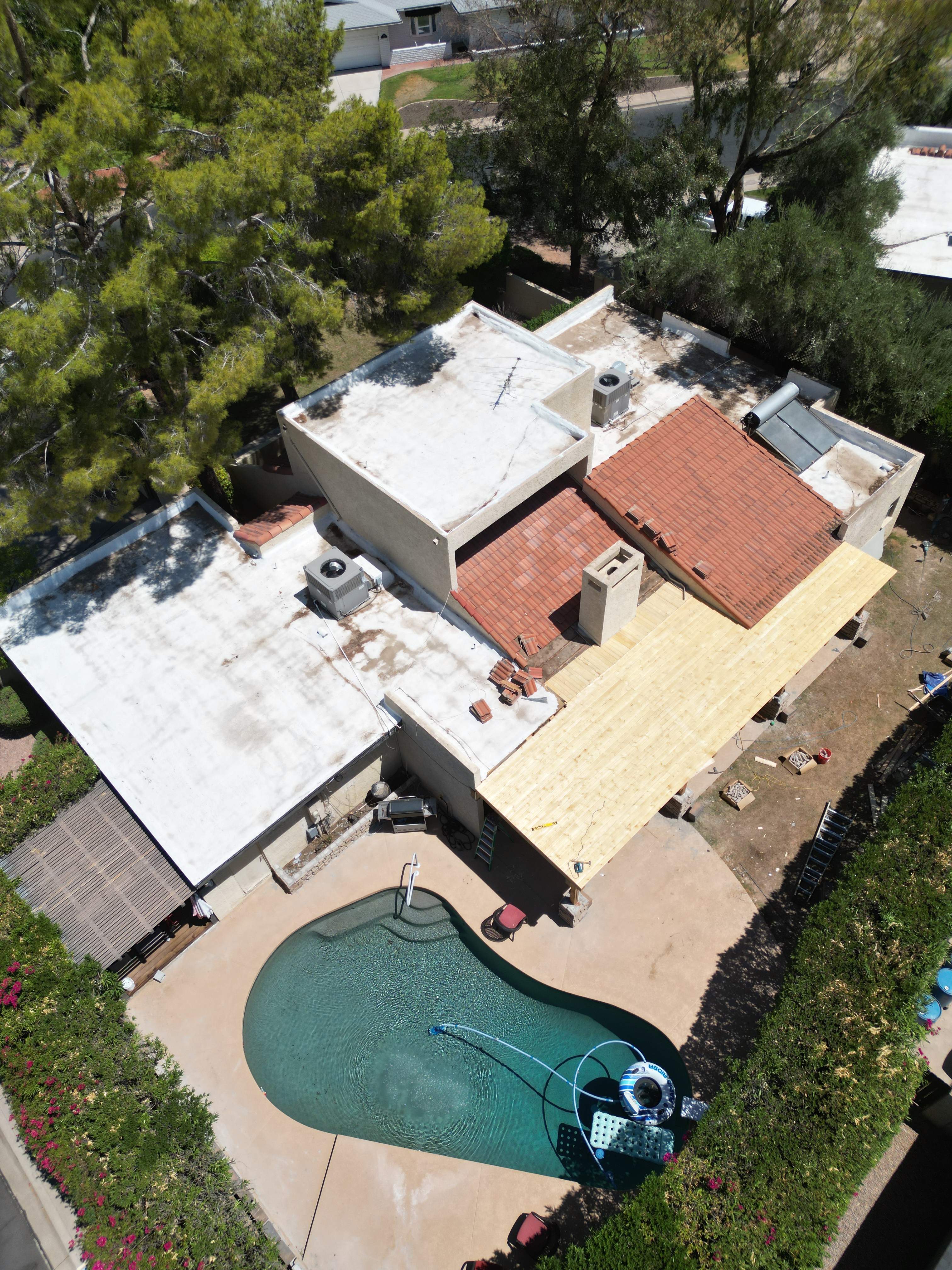 Re-coat & Tile Job by All Storm Roofing & Construction